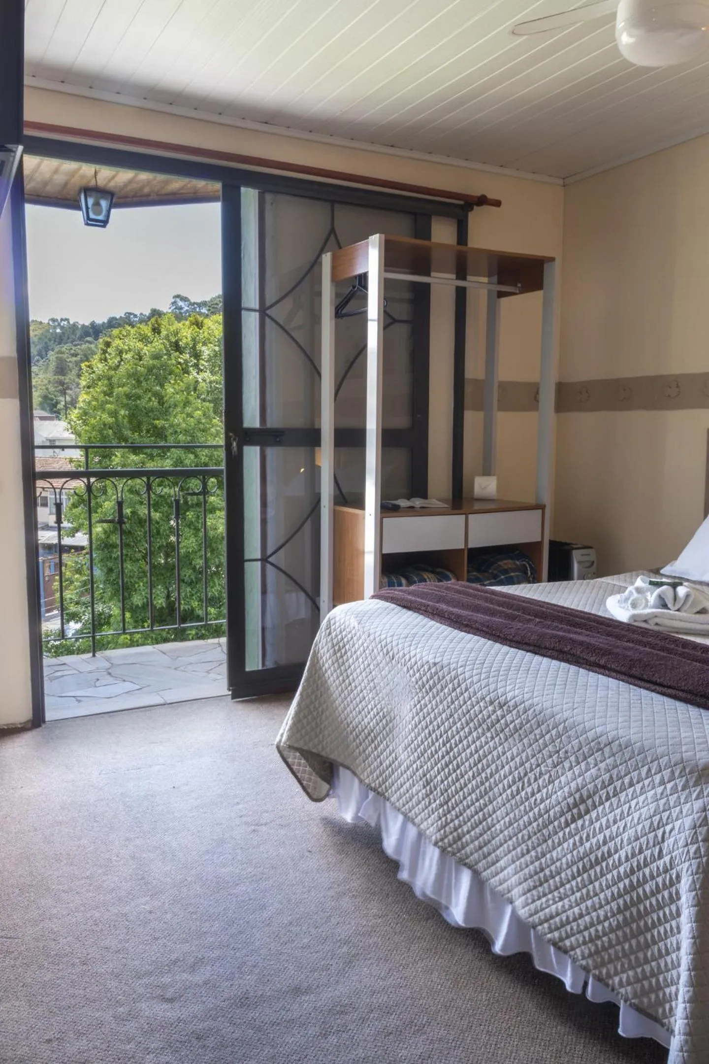 Bed in Pousada Araucária