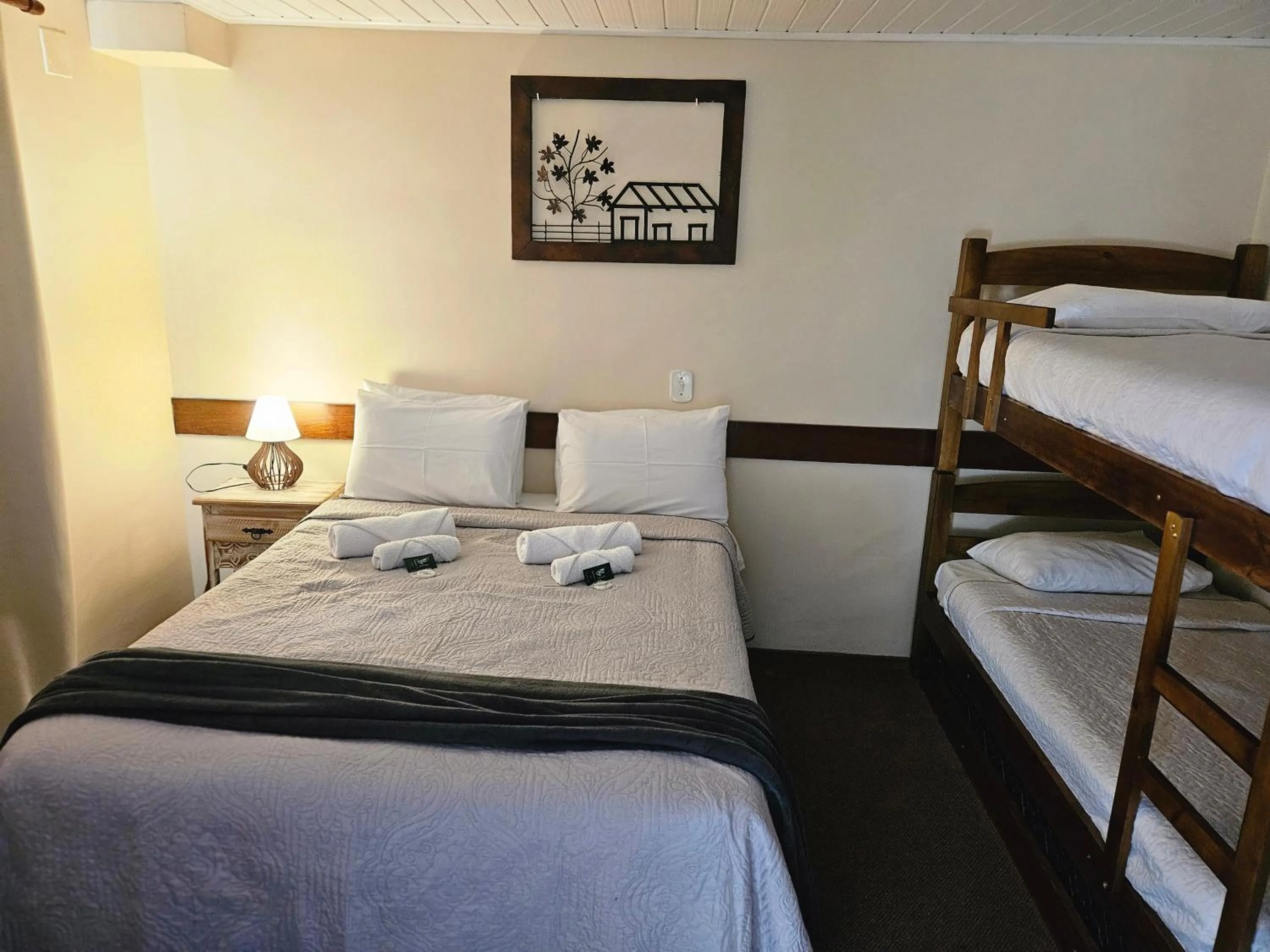 Bed in Pousada Araucária