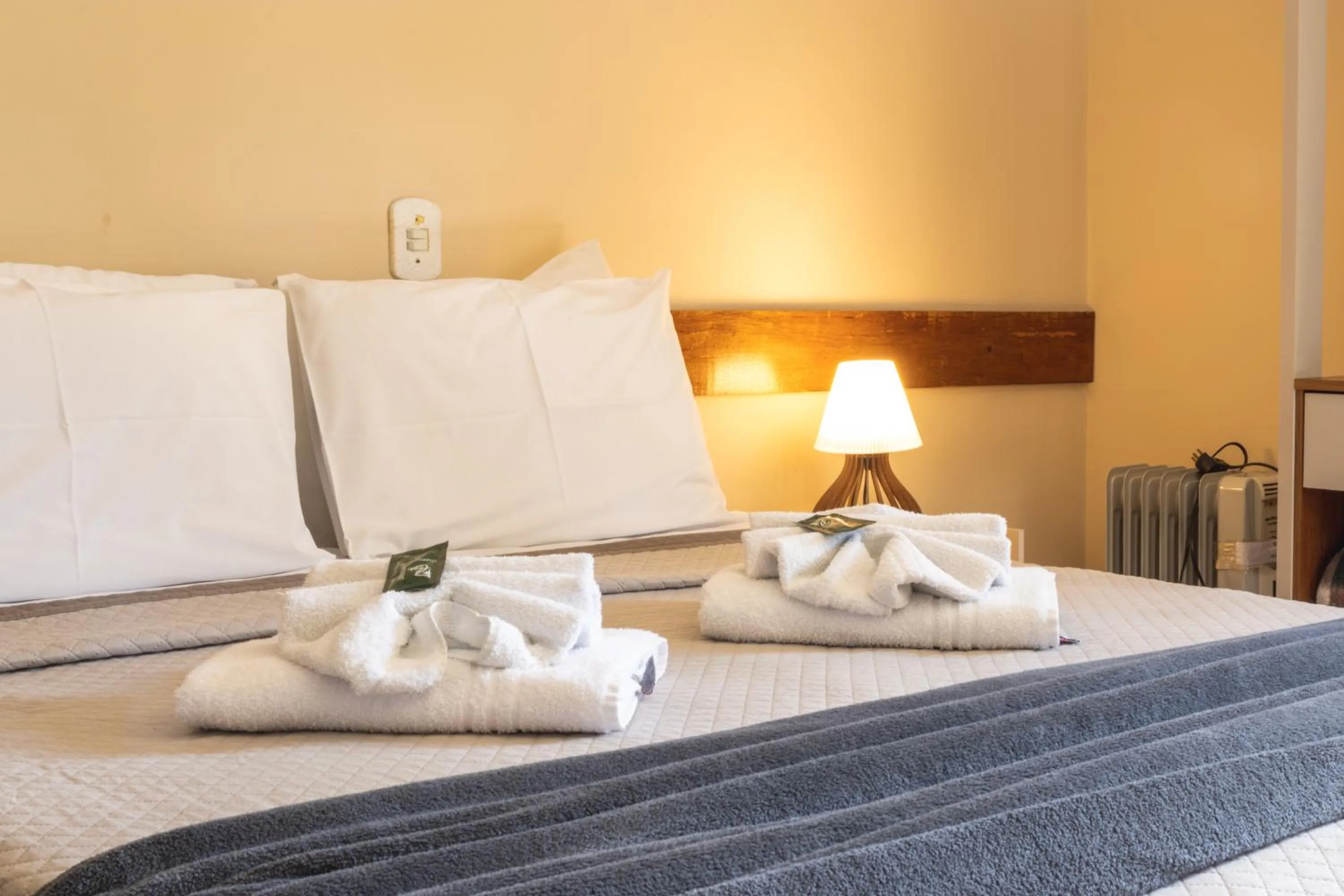 Bed in Pousada Araucária