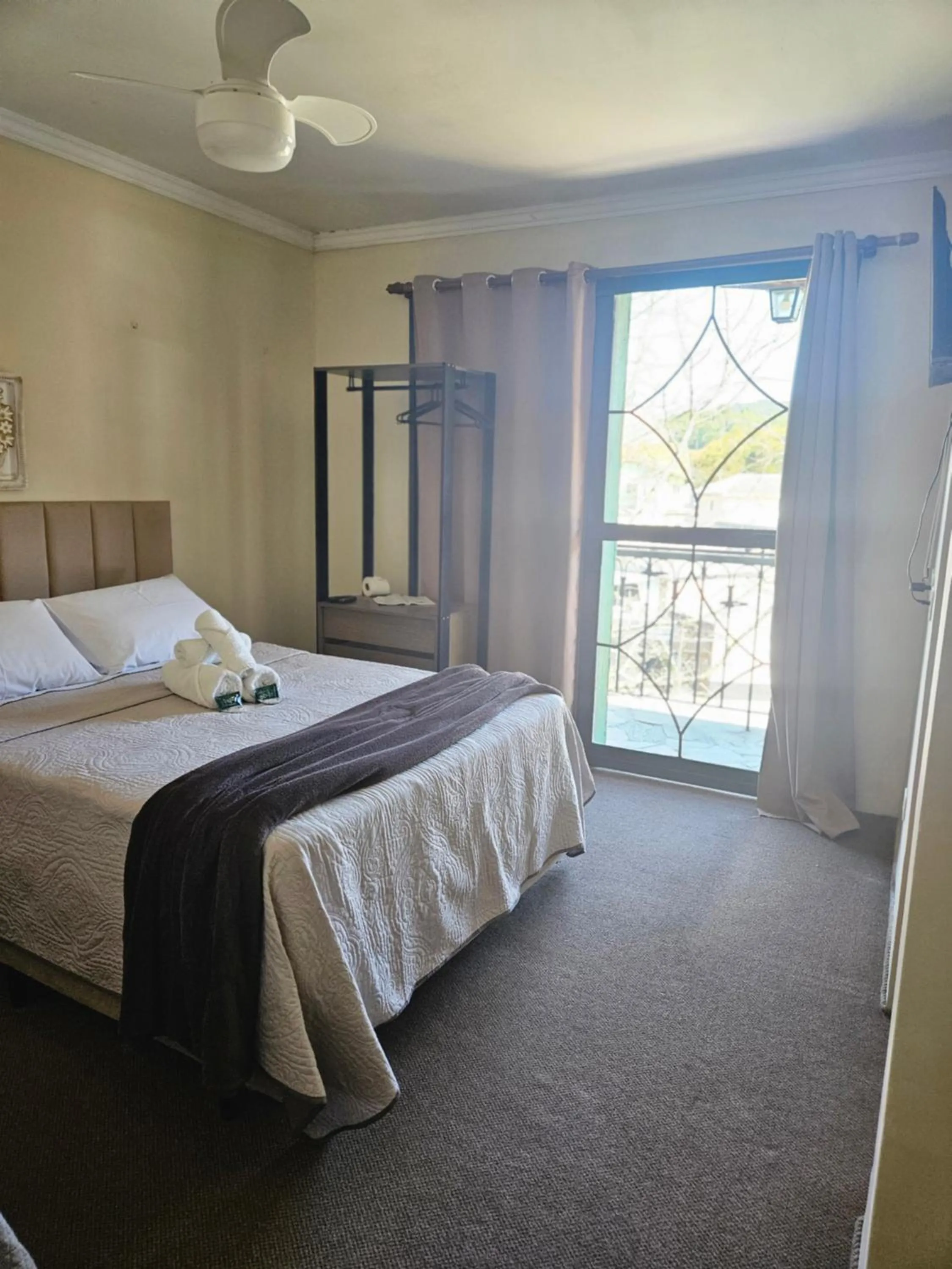 Bed in Pousada Araucária