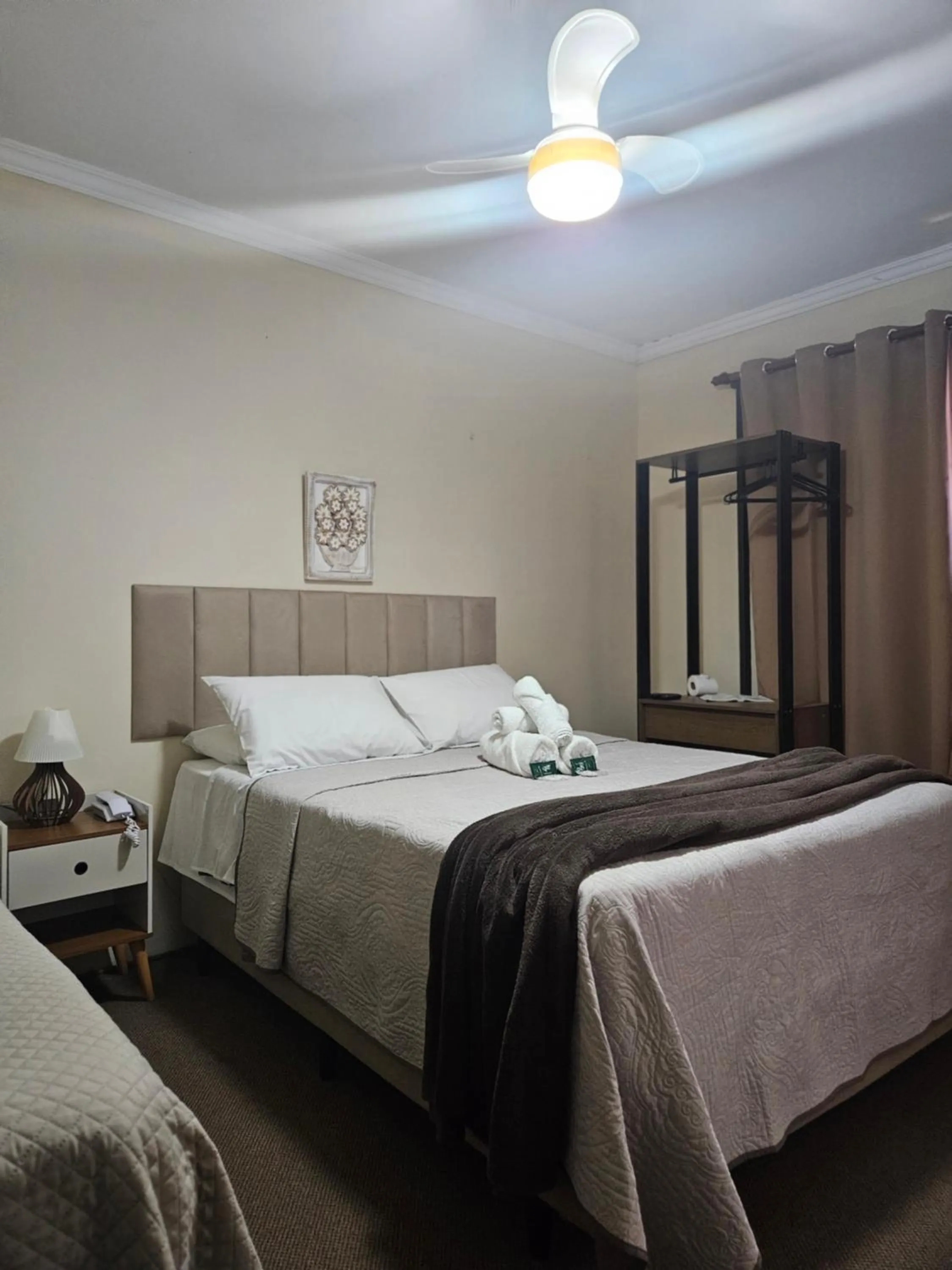 Bed in Pousada Araucária