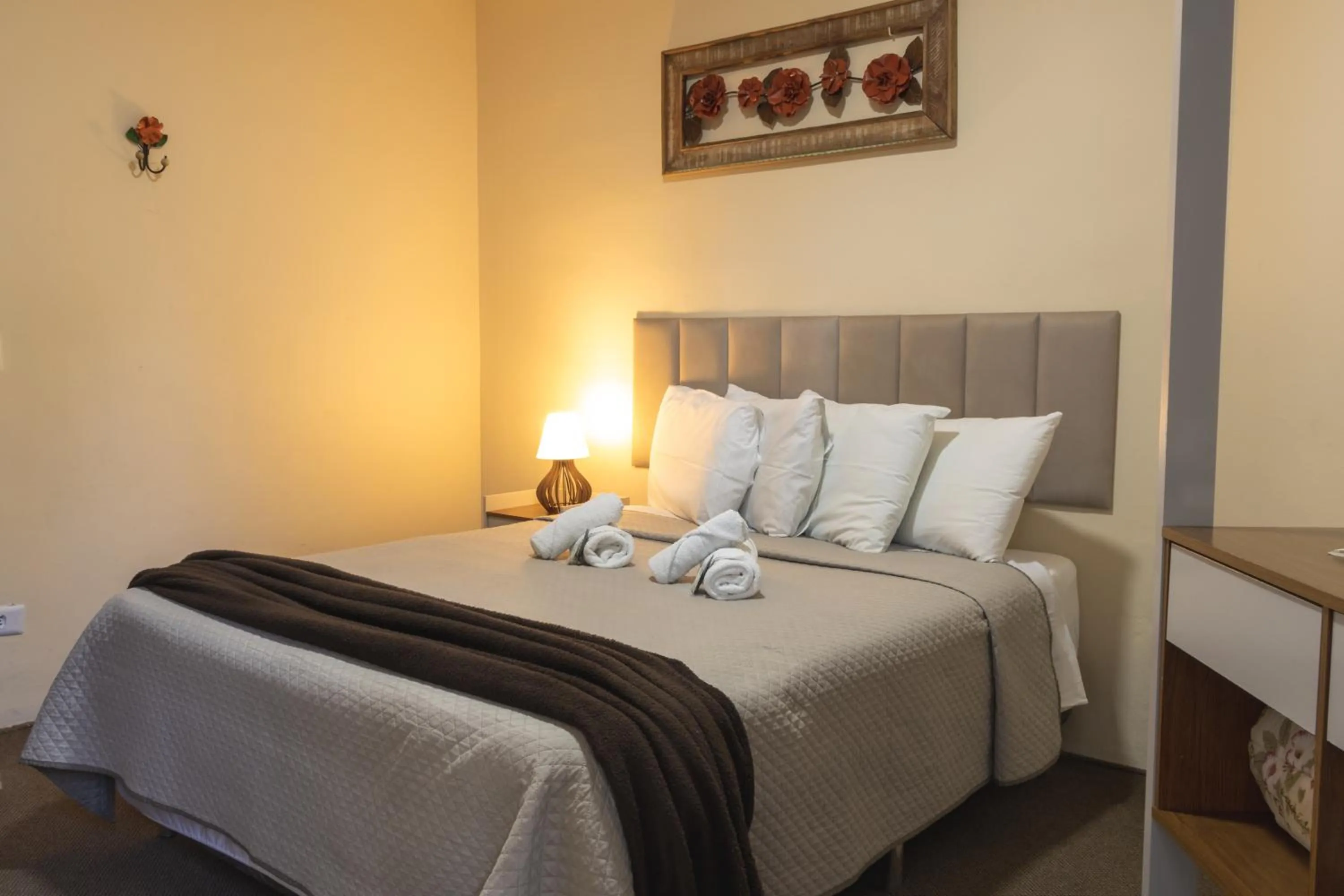 Bed in Pousada Araucária