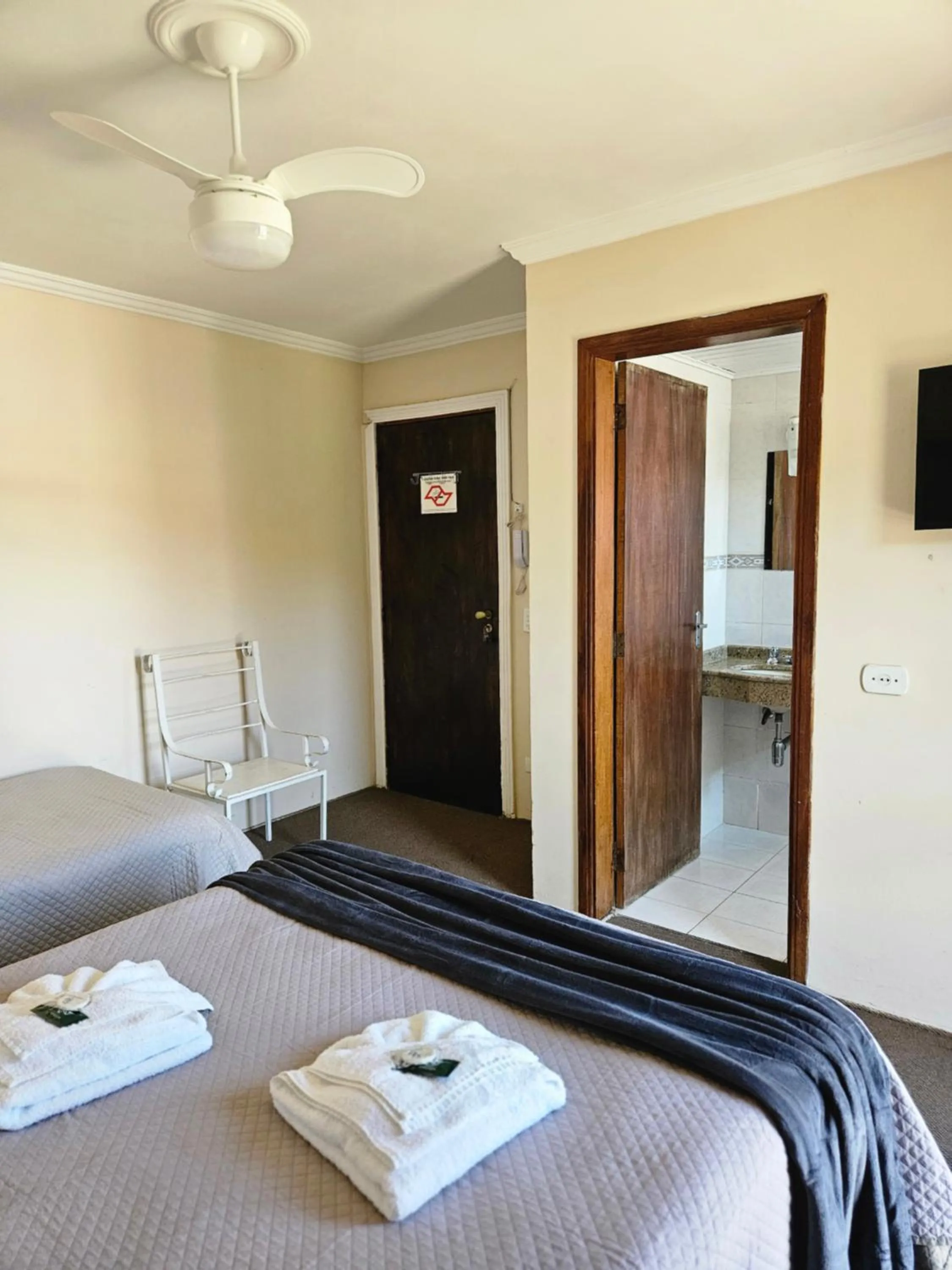 Bed in Pousada Araucária