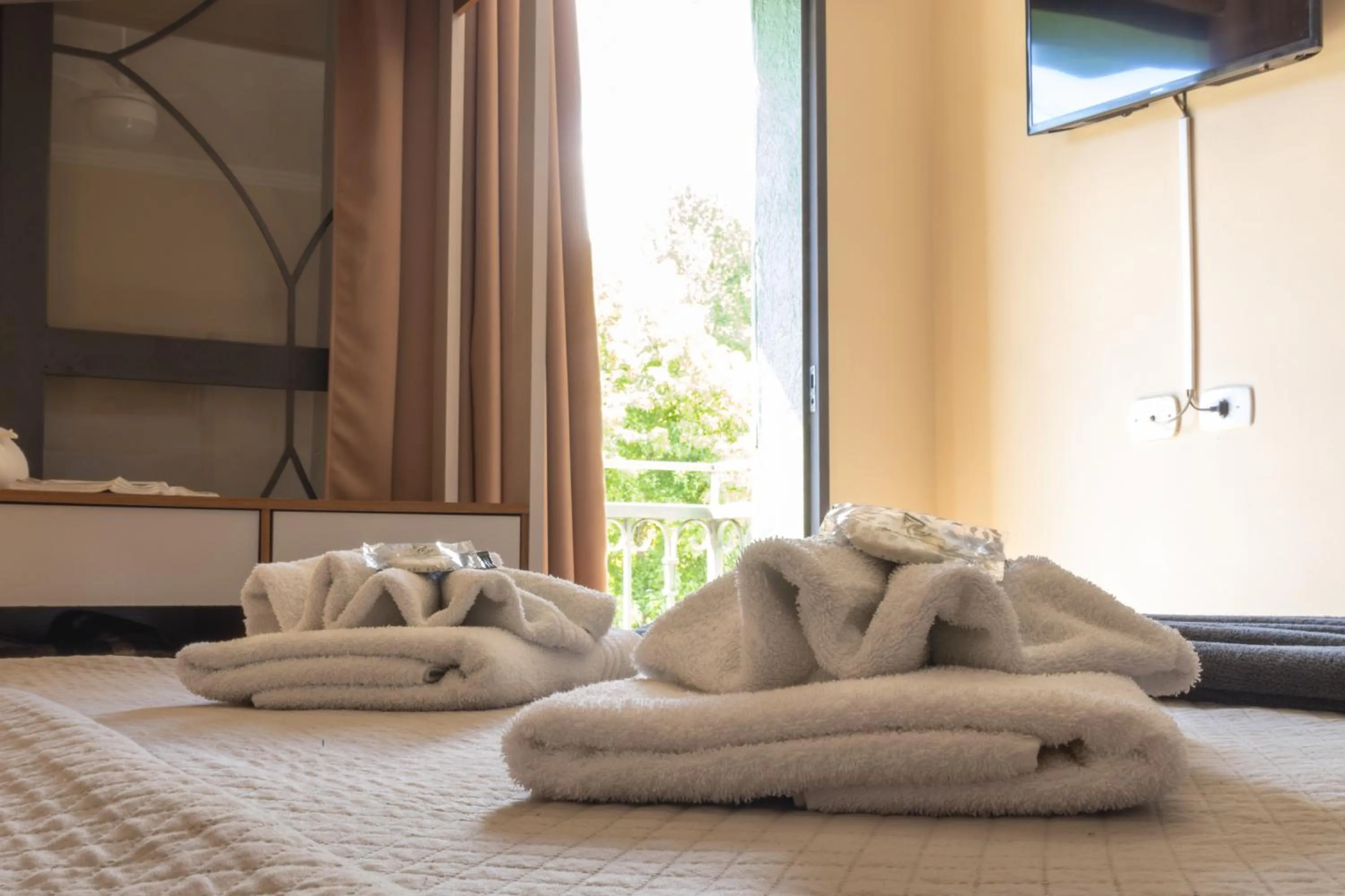 Bed in Pousada Araucária