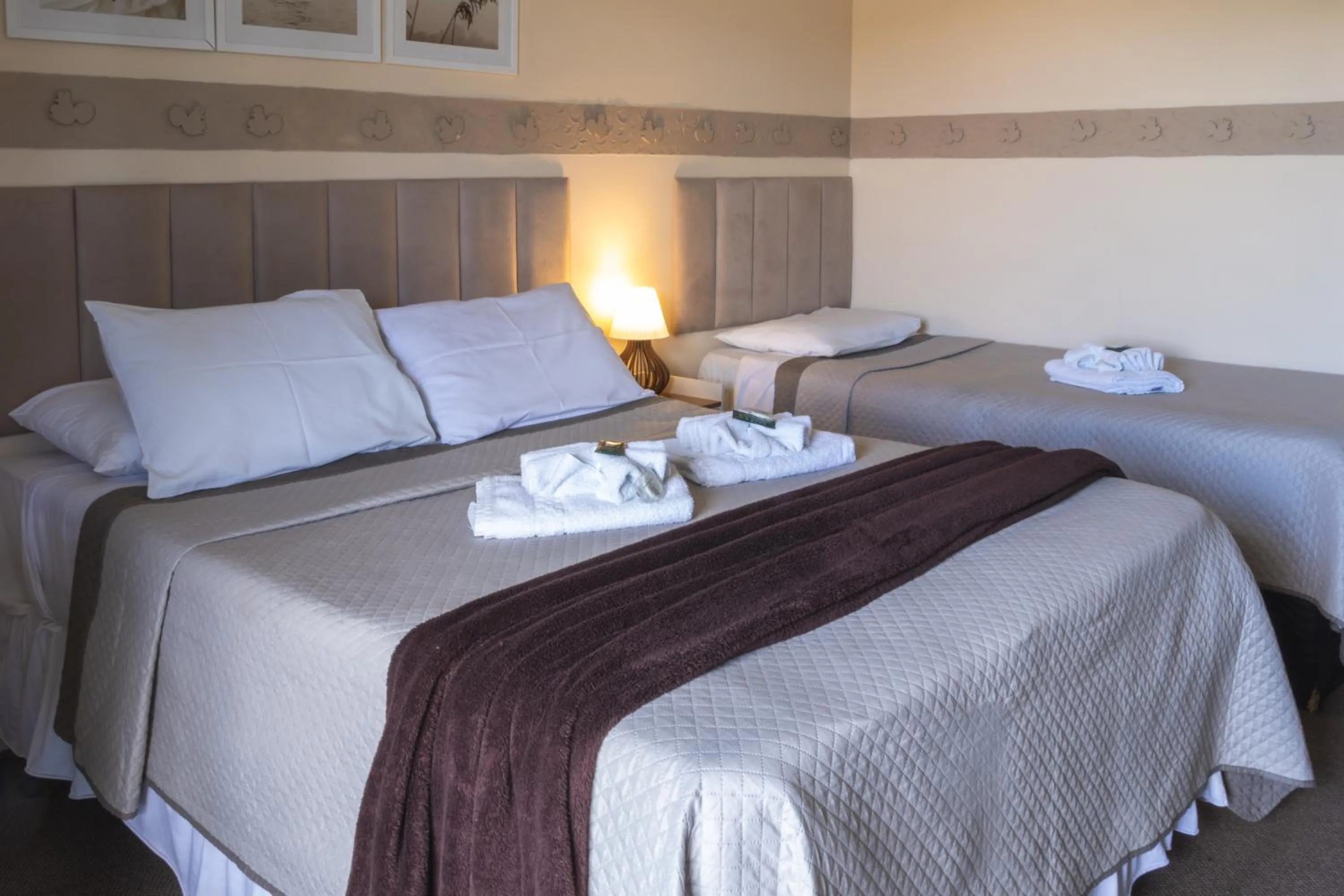 Bed in Pousada Araucária