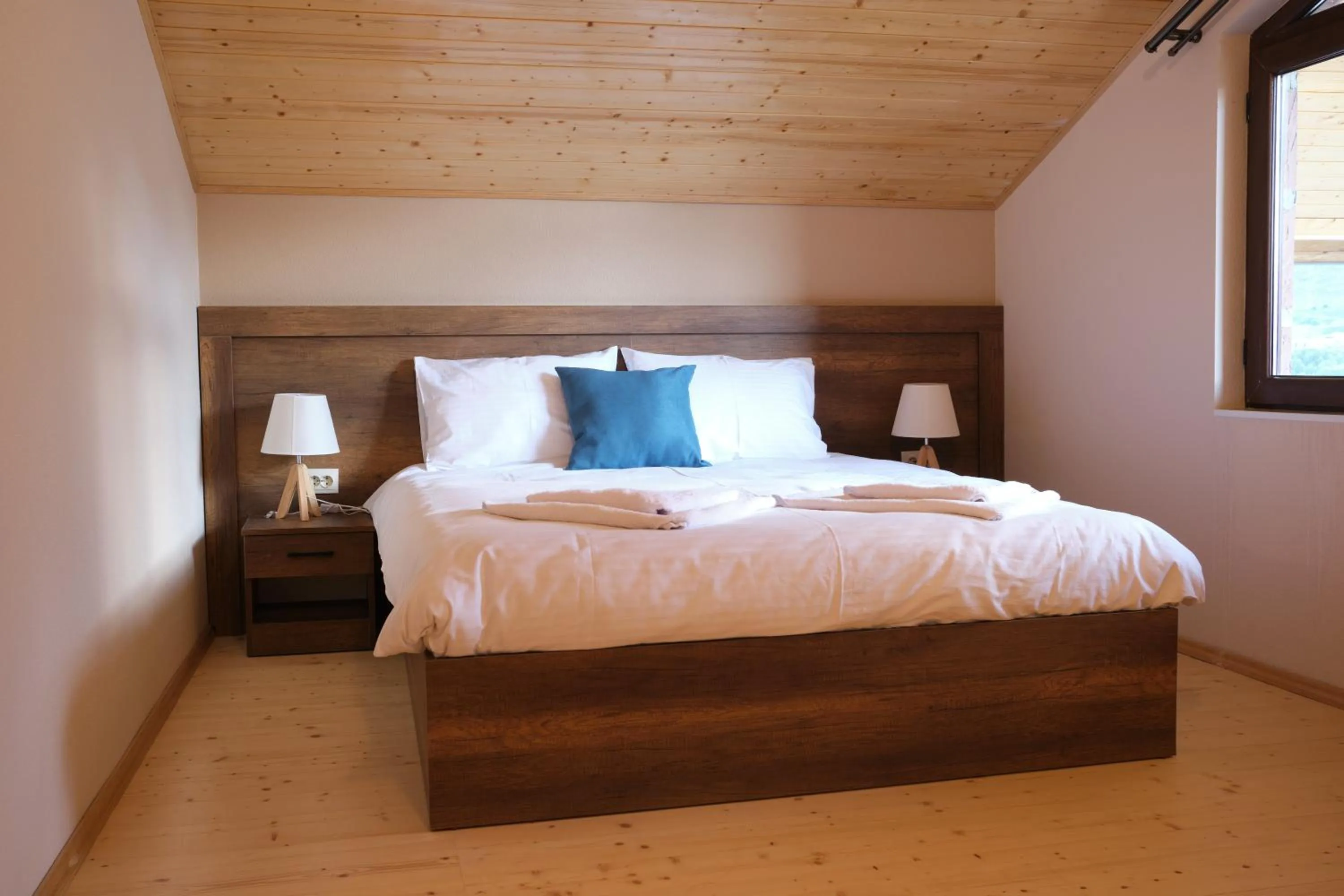 Bed in Hotel Axien Kazbegi