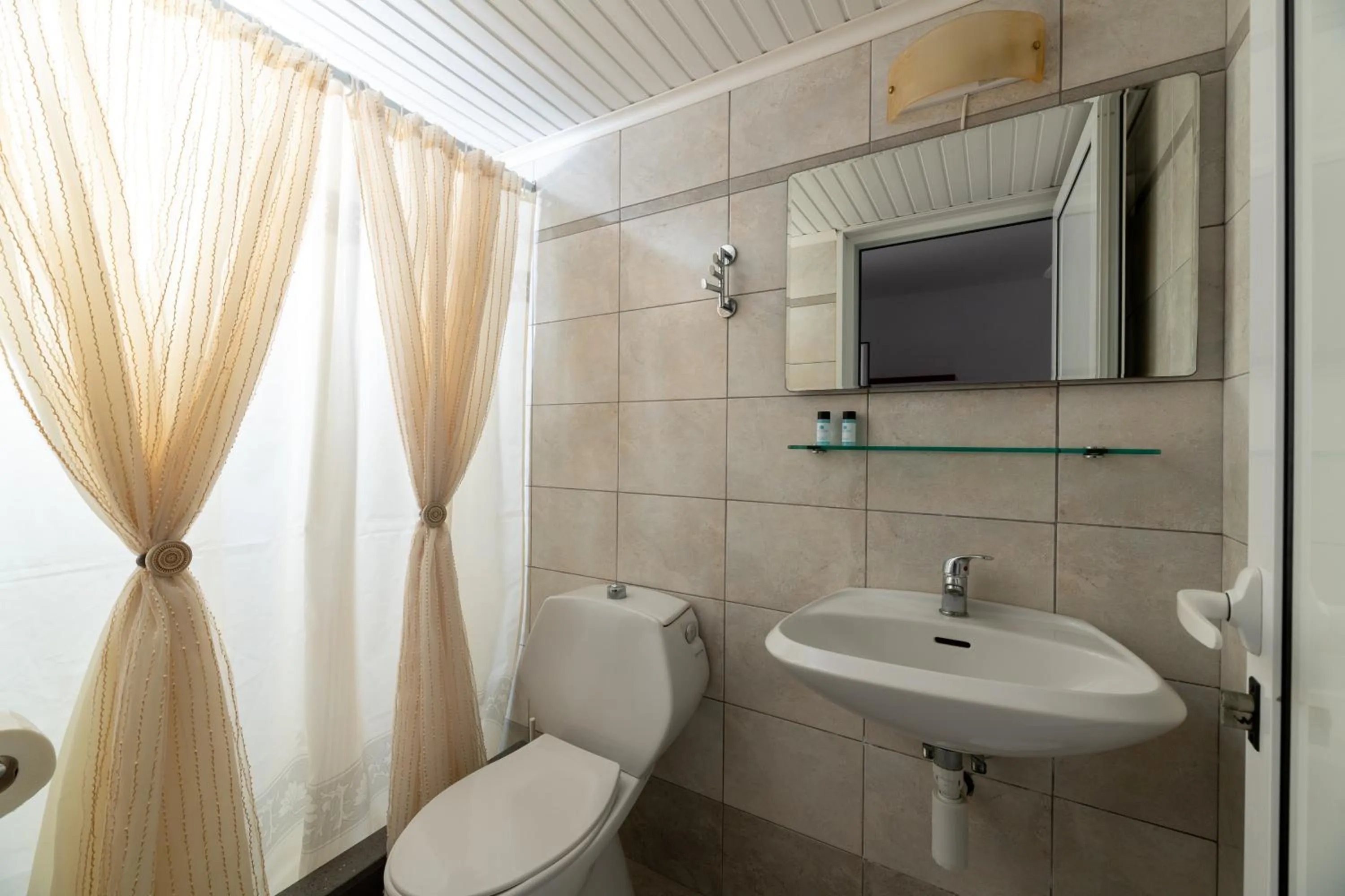 Bathroom in Pefkos View Apartments