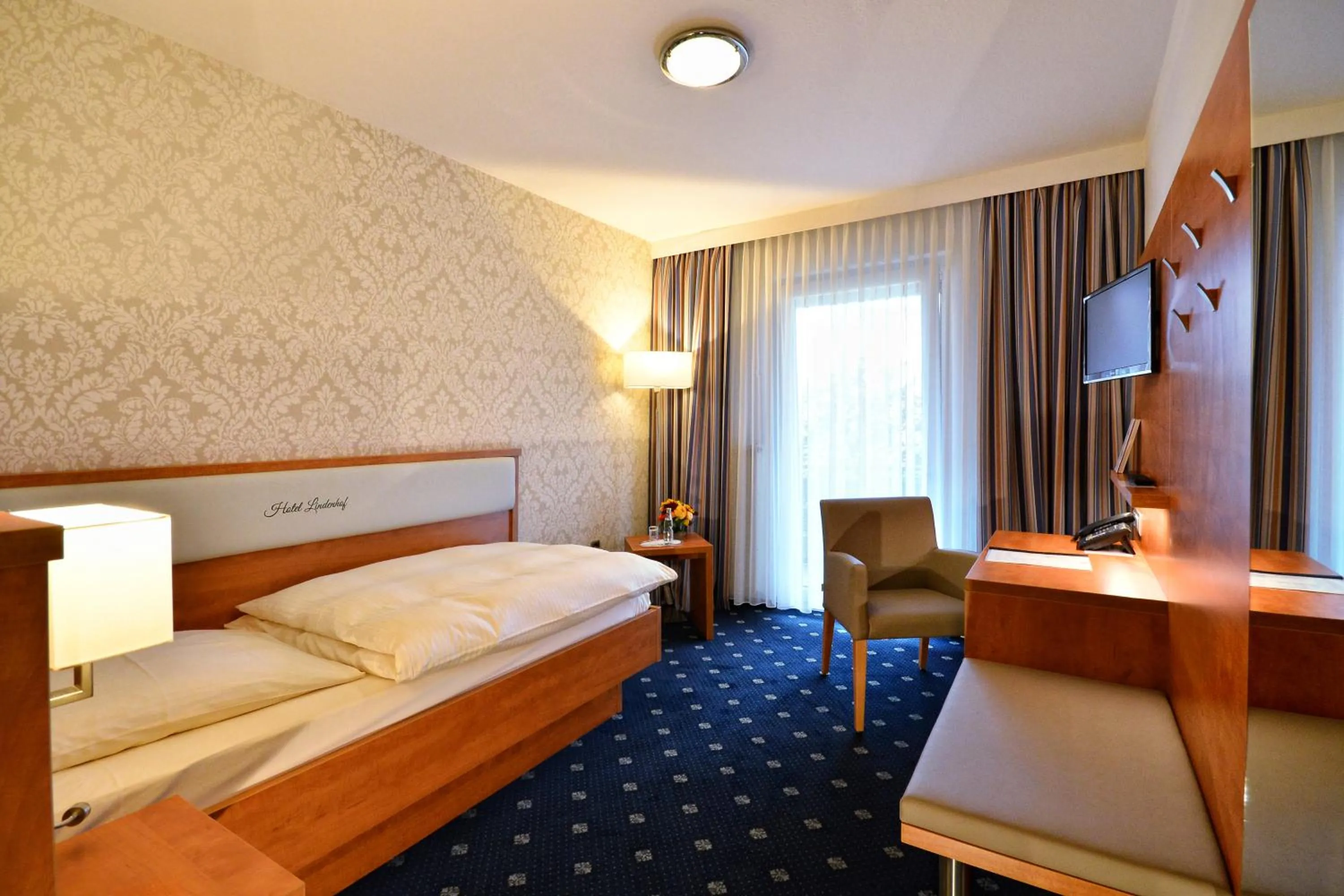 Photo of the whole room, Bed in Landgasthaus & Hotel Lindenhof