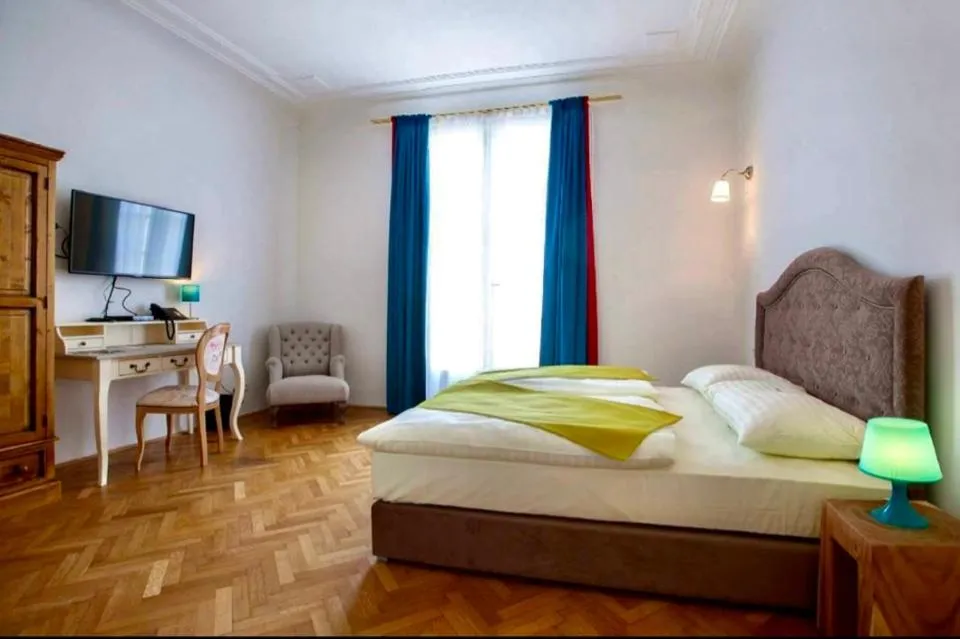 Bed in Hotel Pension Museum