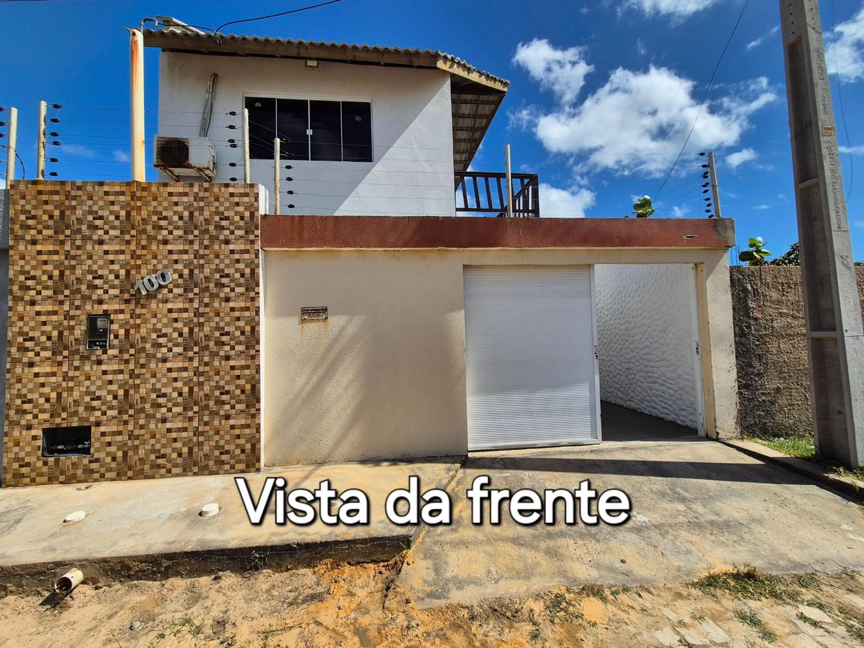 Street view in Casa na praia com vista para o mar