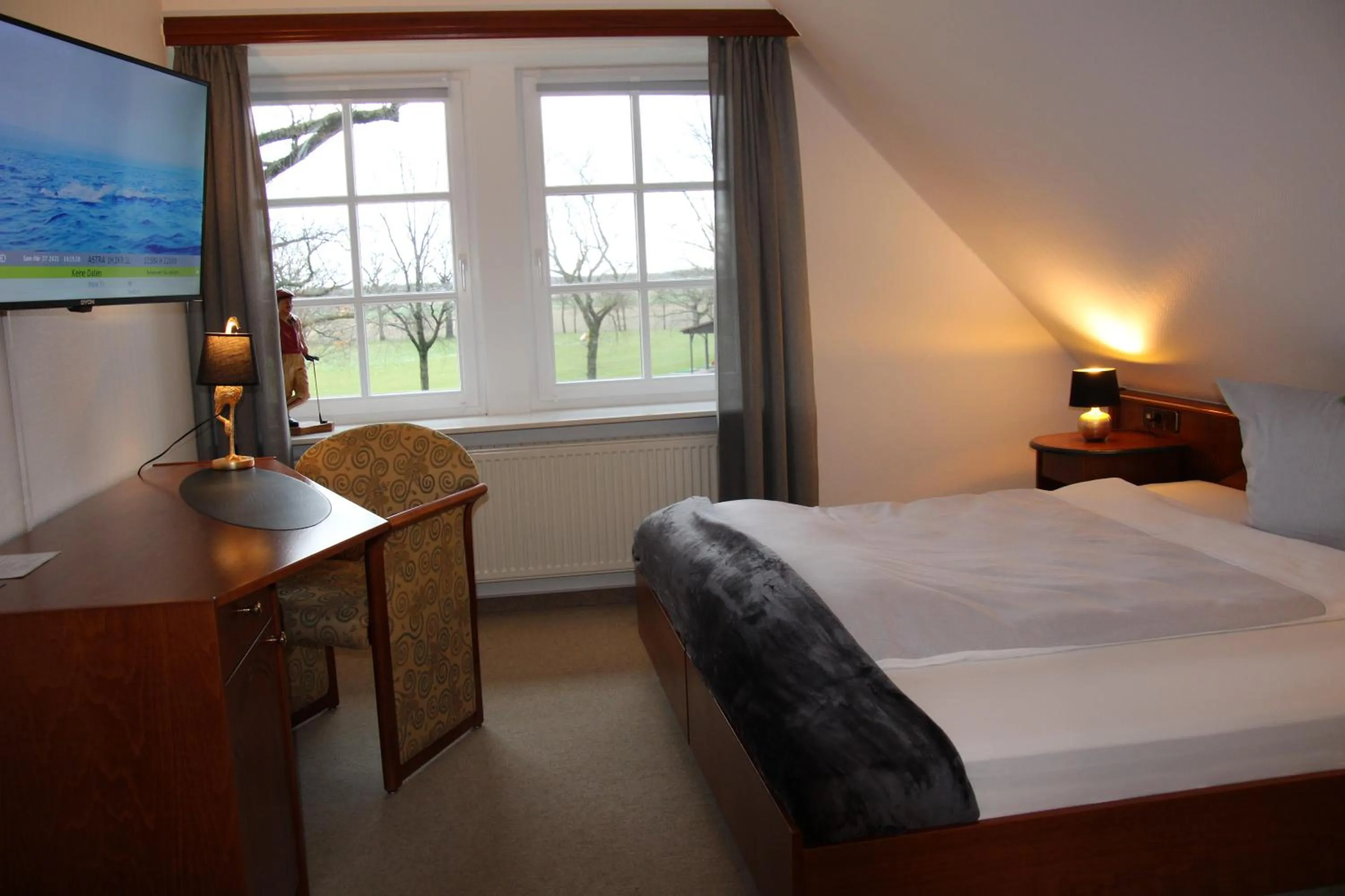 Photo of the whole room, Bed in Landhaus am Golfpark Inhaber Marko Nolden