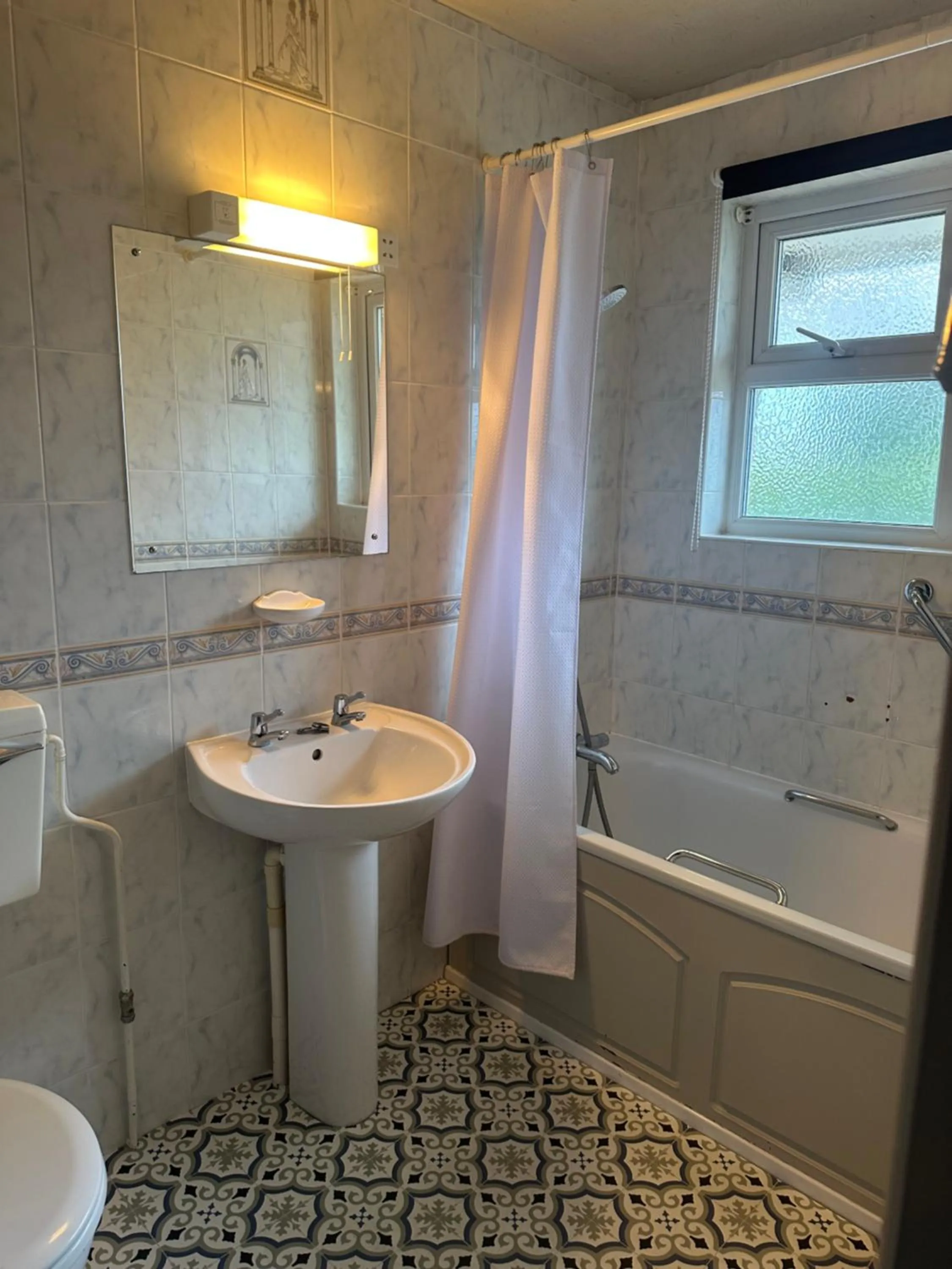 Bathroom in The Q Hotel