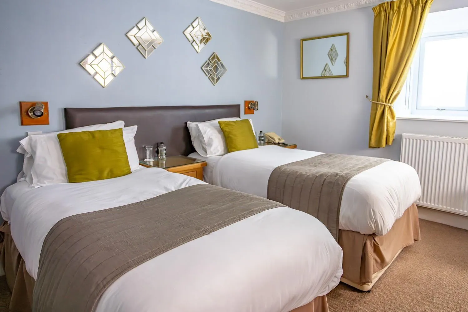 Bed in New Holmwood Hotel