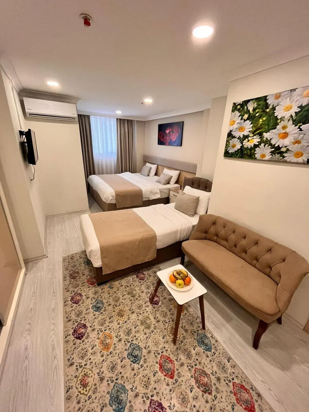 Economy Triple Room in Şimal Hotel Economy Triple Room in Şimal Hotel