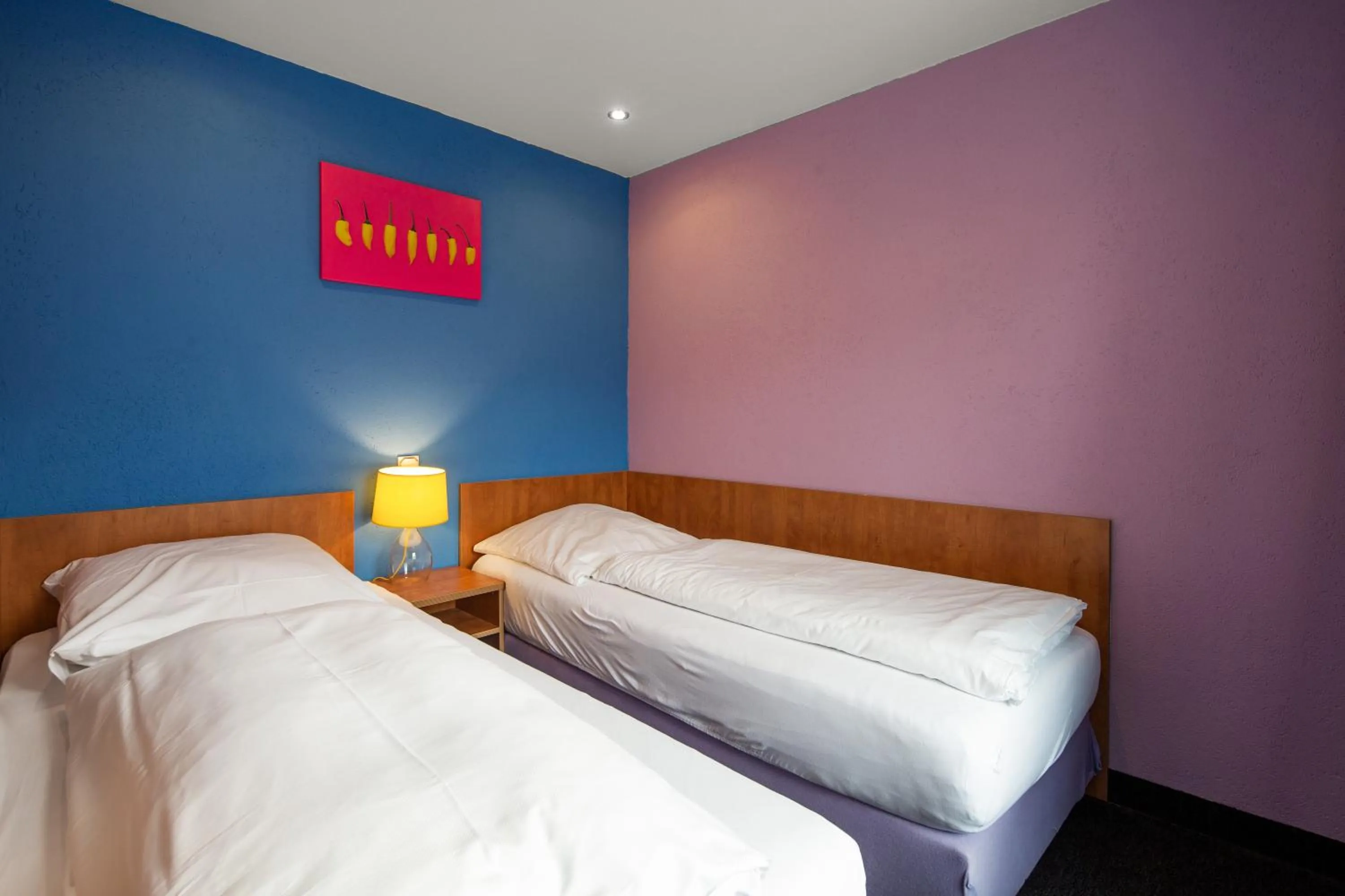 Bed in SmartHotel Flamingo Self check-in