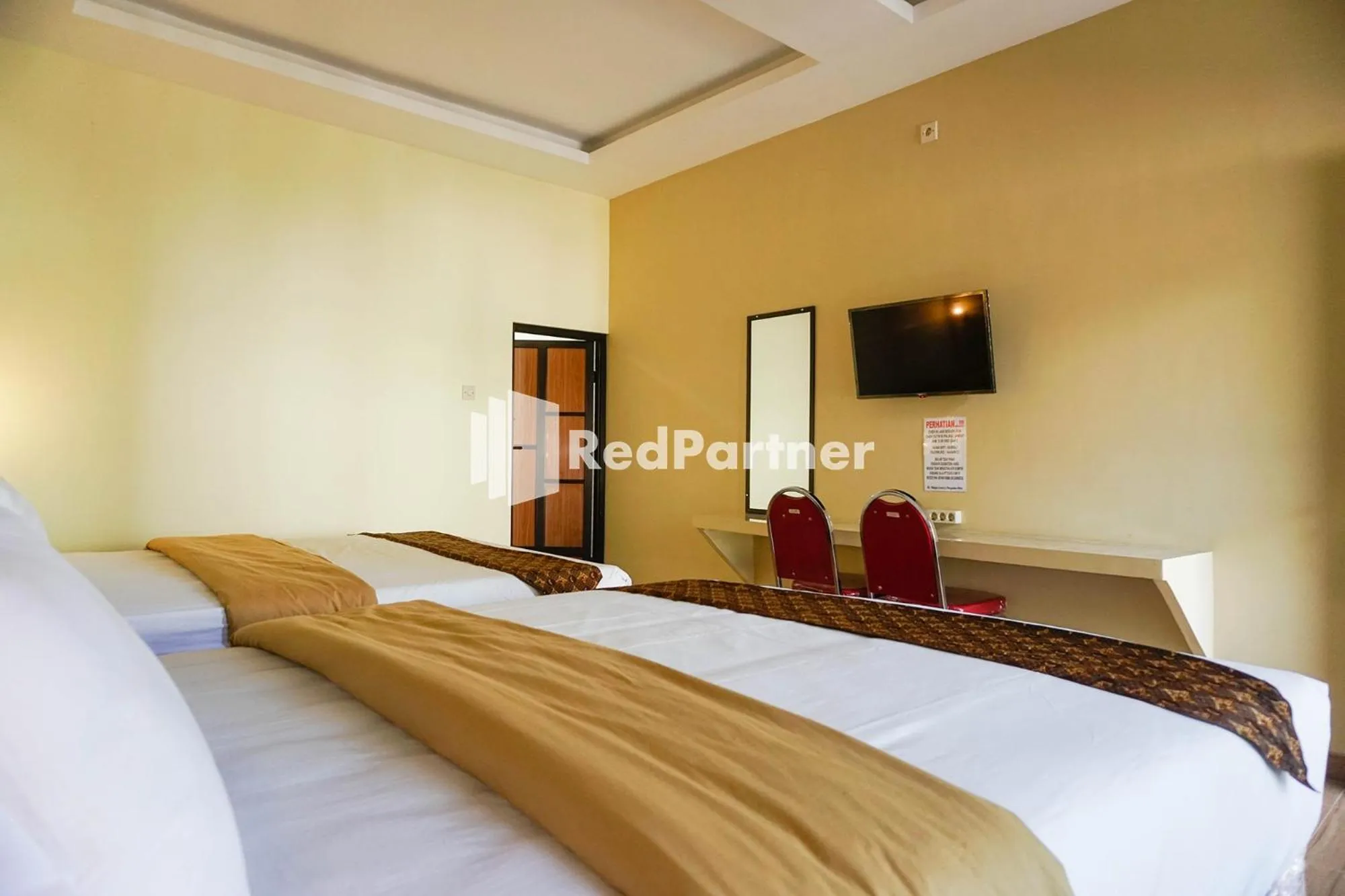Bed in Griya Imafa Inn RedPartner near Jatim Park 2