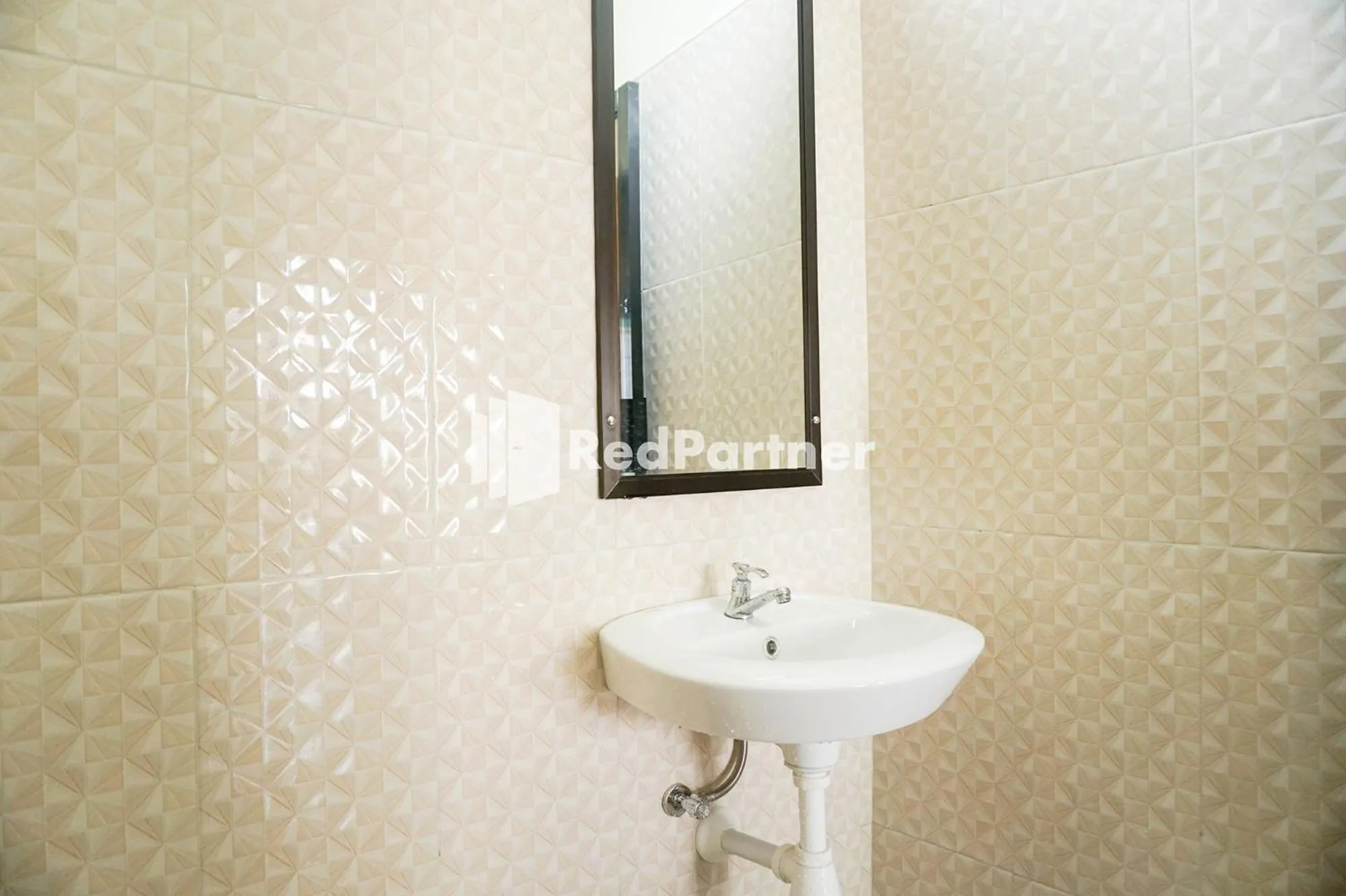 Bathroom in Griya Imafa Inn RedPartner near Jatim Park 2