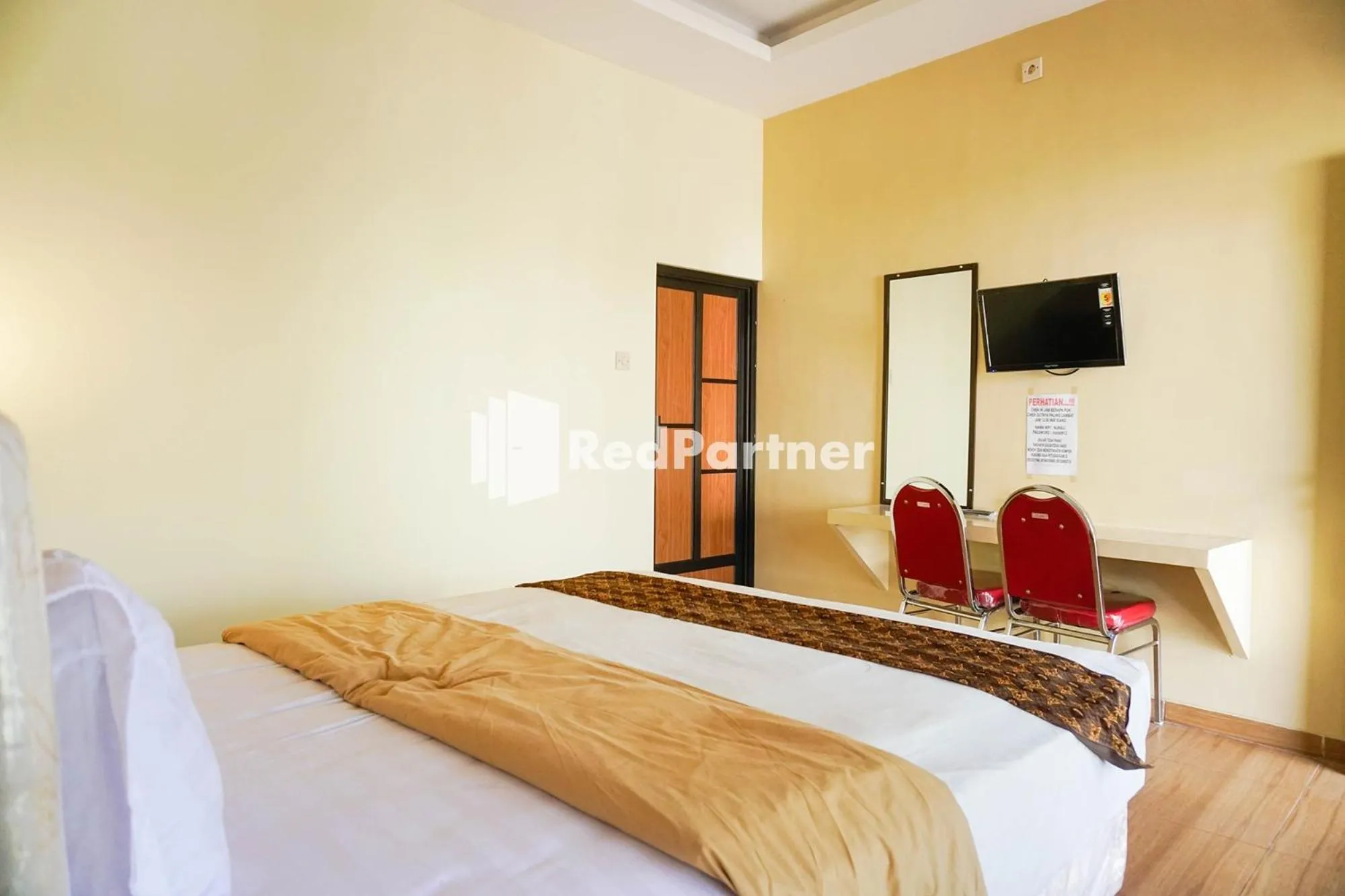 Bed in Griya Imafa Inn RedPartner near Jatim Park 2