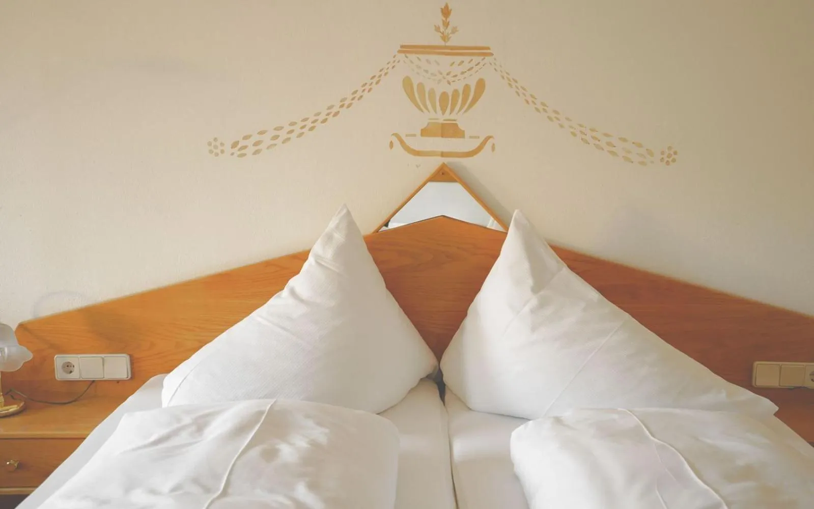 Decorative detail, Bed in Hotel Pfleger