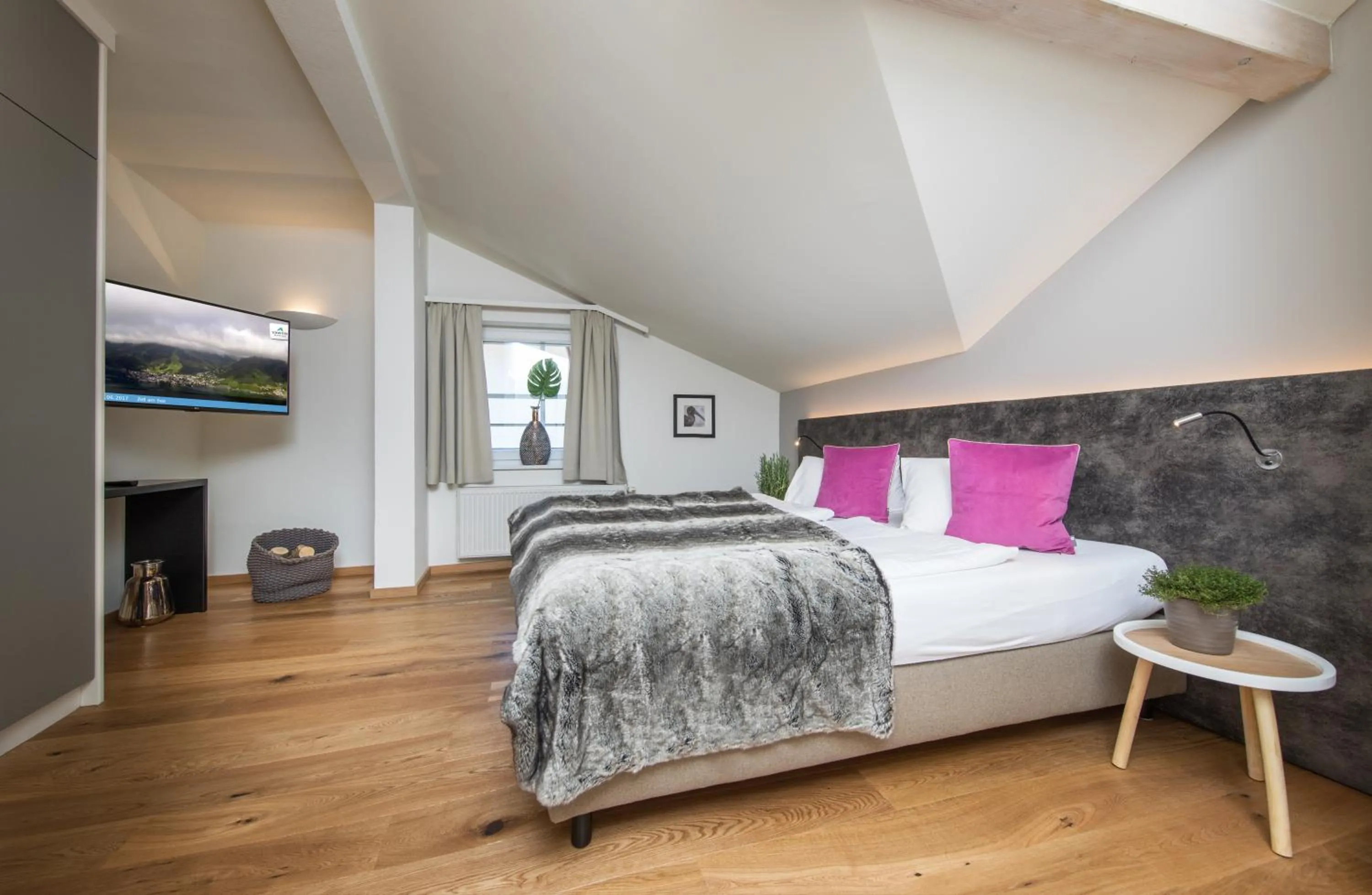 Bedroom, Bed in HEITZMANN - Hotel & Rooftop