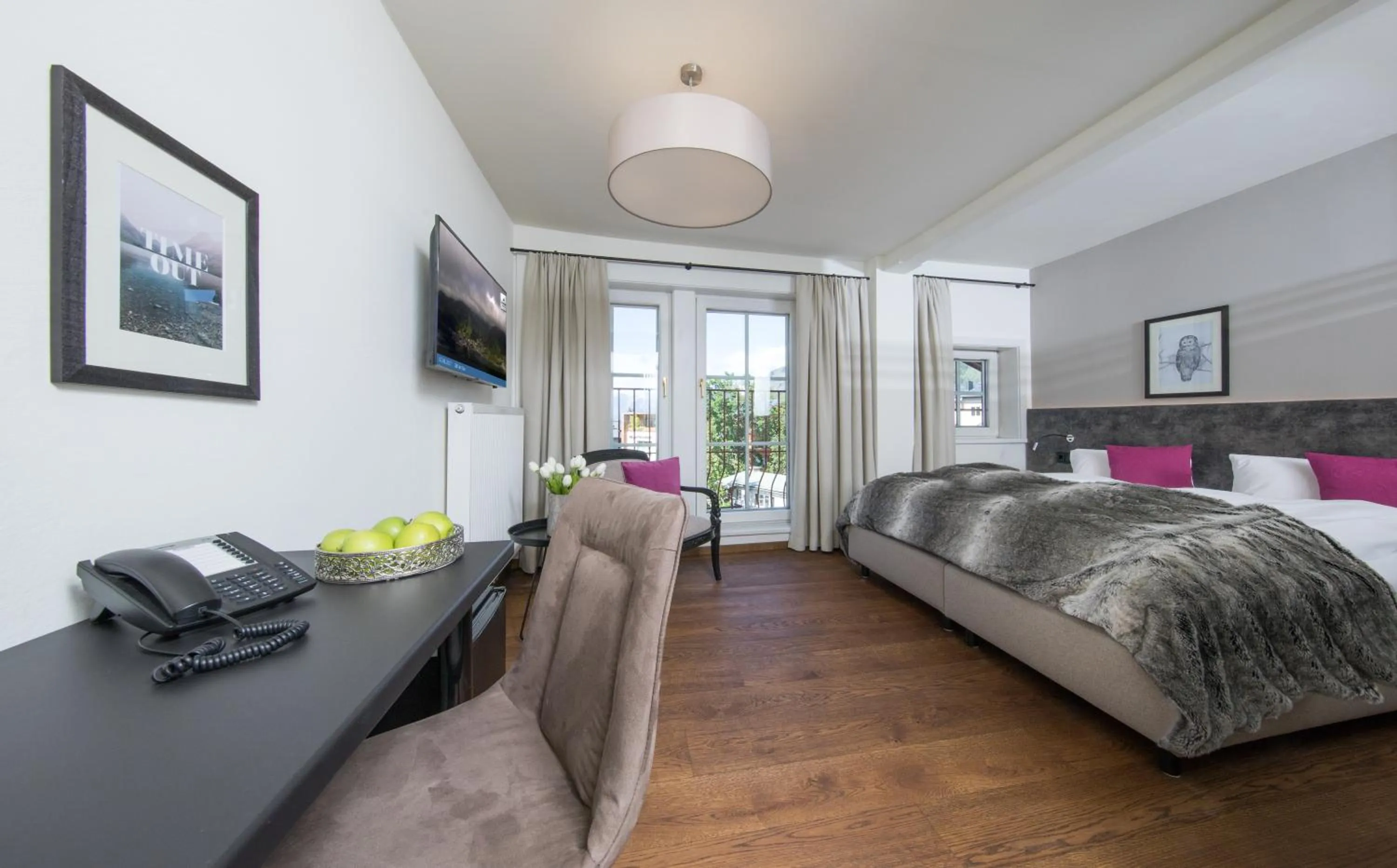 Photo of the whole room, Bed in HEITZMANN - Hotel & Rooftop