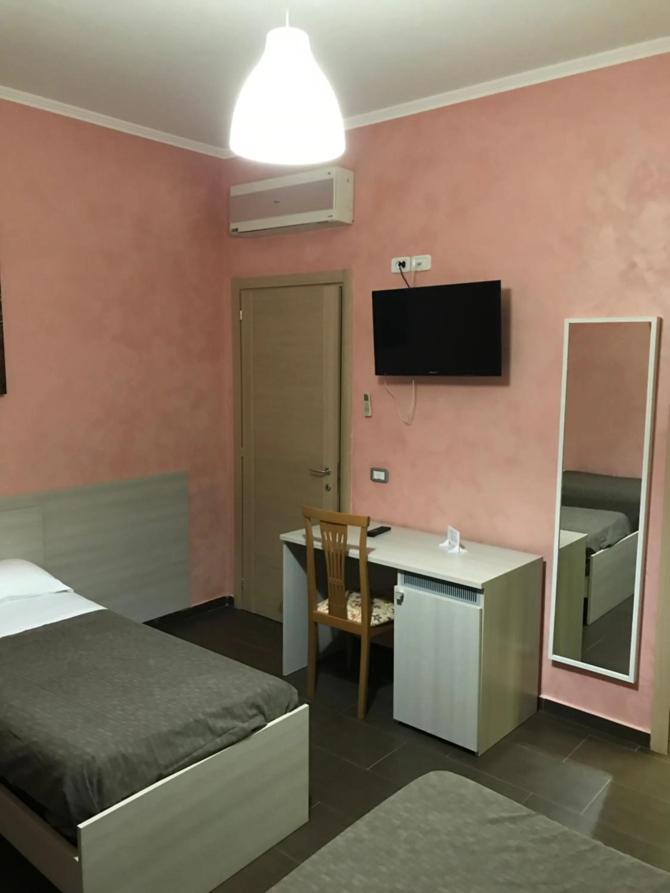 Bed in Villa Scotillo Boutique Hotel