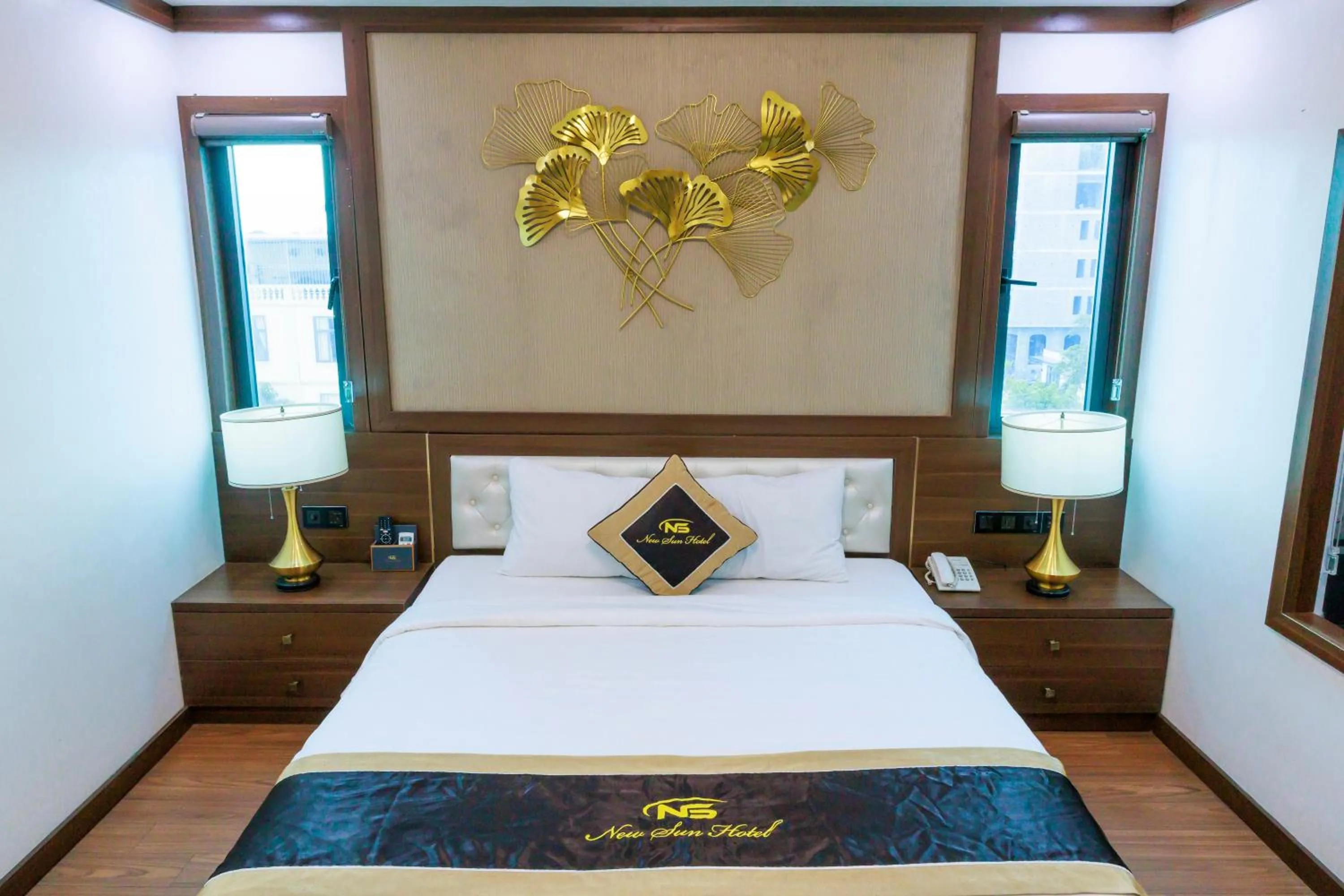 Bed in New Sun Móng Cái Hotel