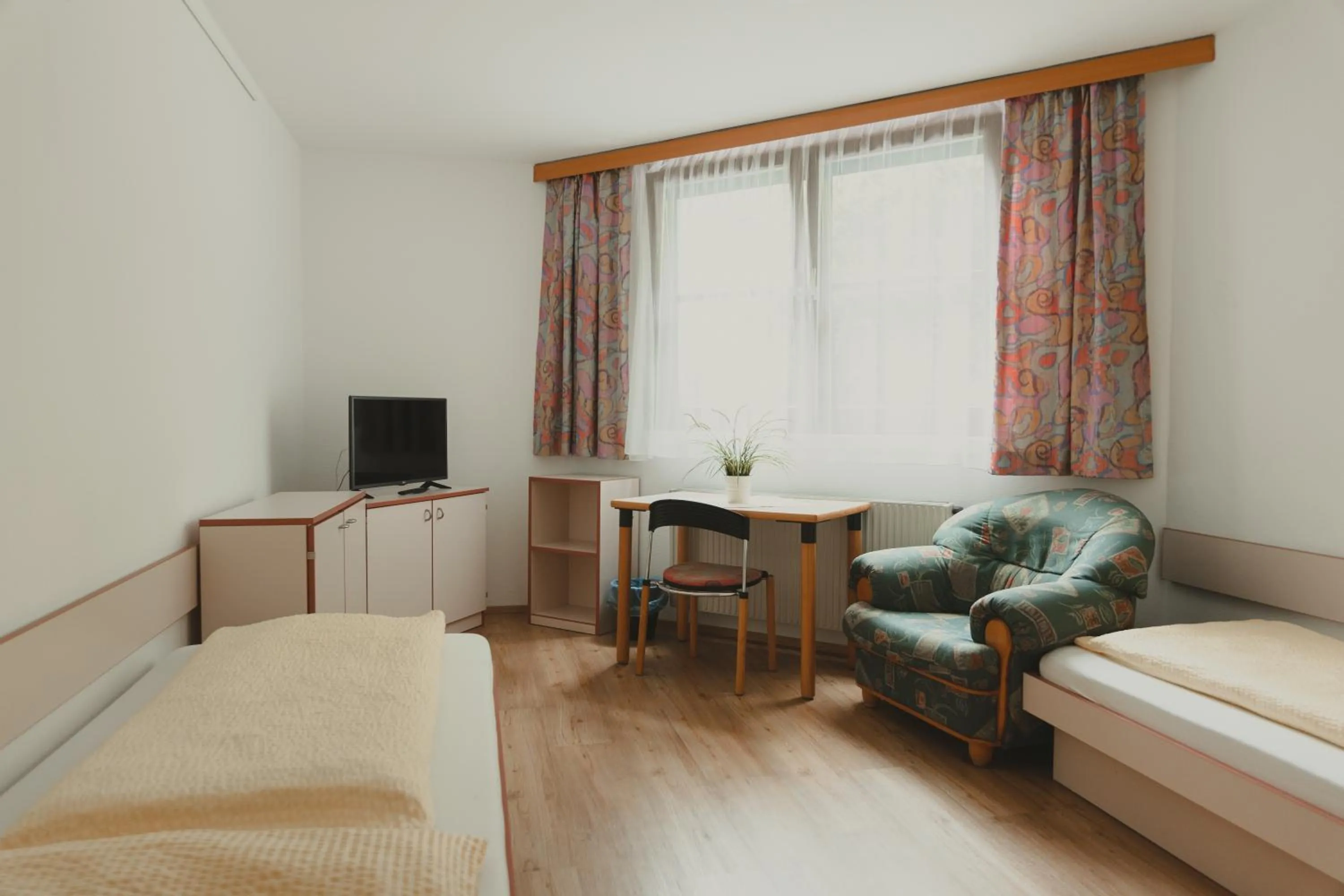 Photo of the whole room, Bed in Sommerhotel Karwendel