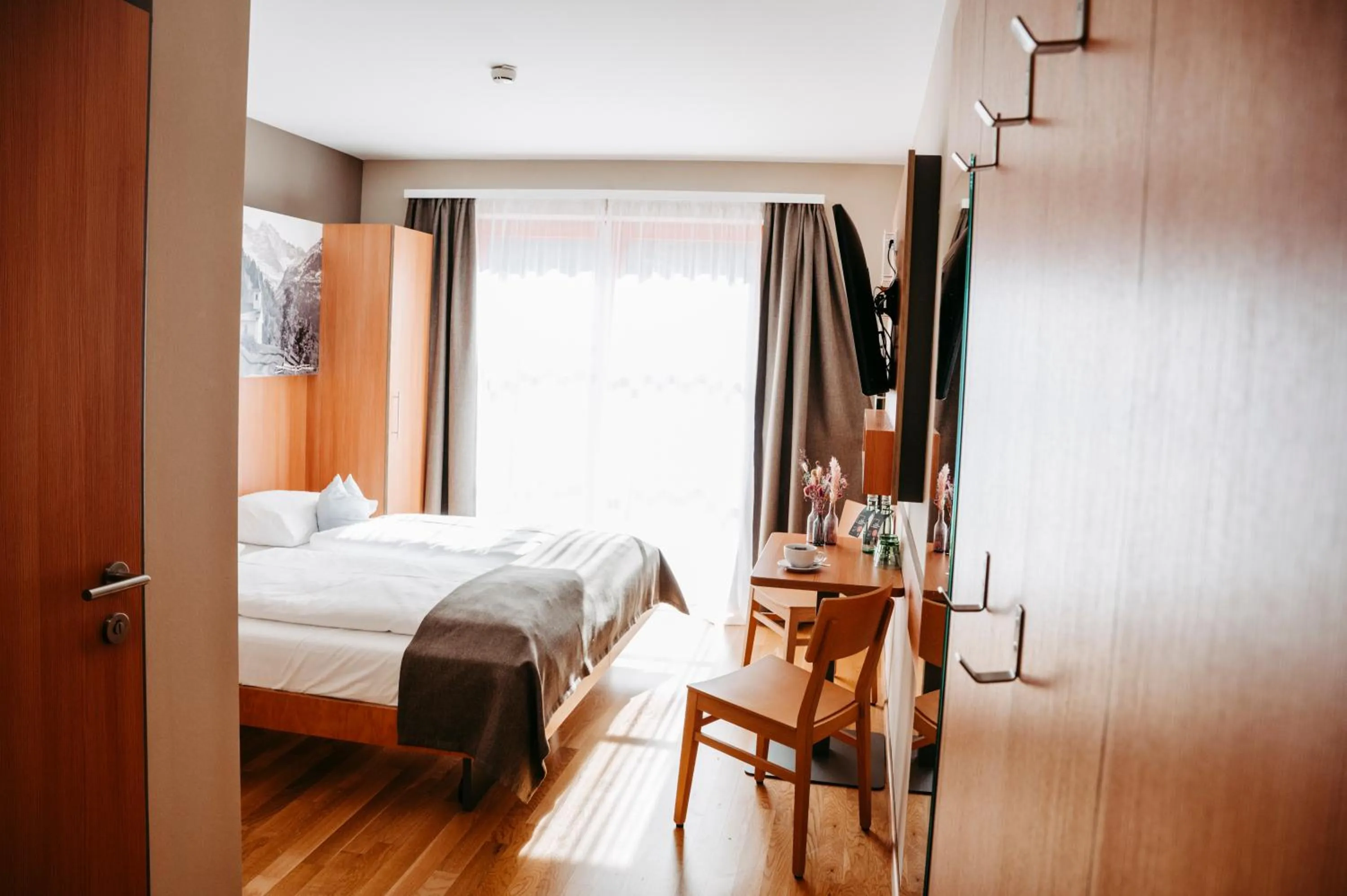 Photo of the whole room, Bed in JUFA Hotel Wipptal