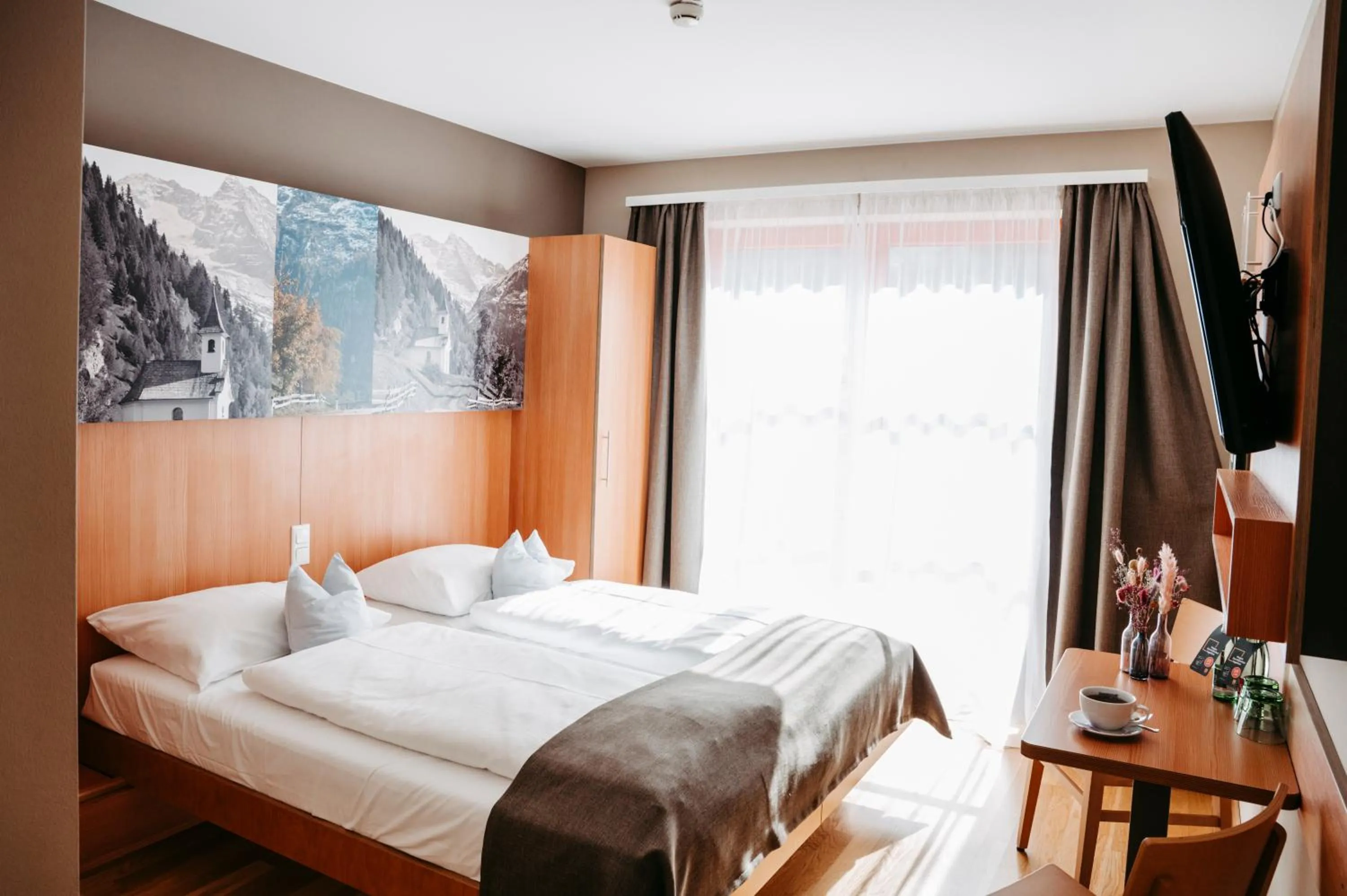 Bed in JUFA Hotel Wipptal