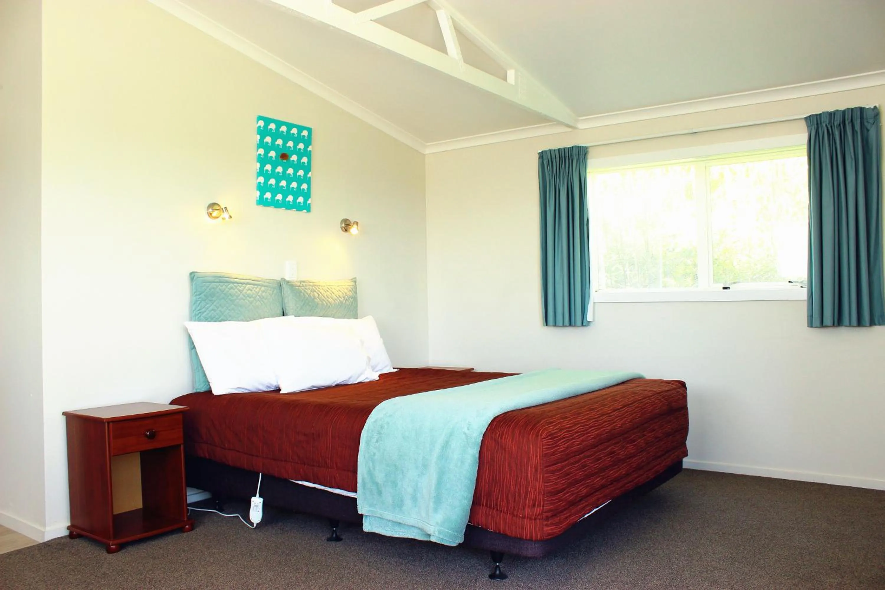 Bed in Te Awa Motel