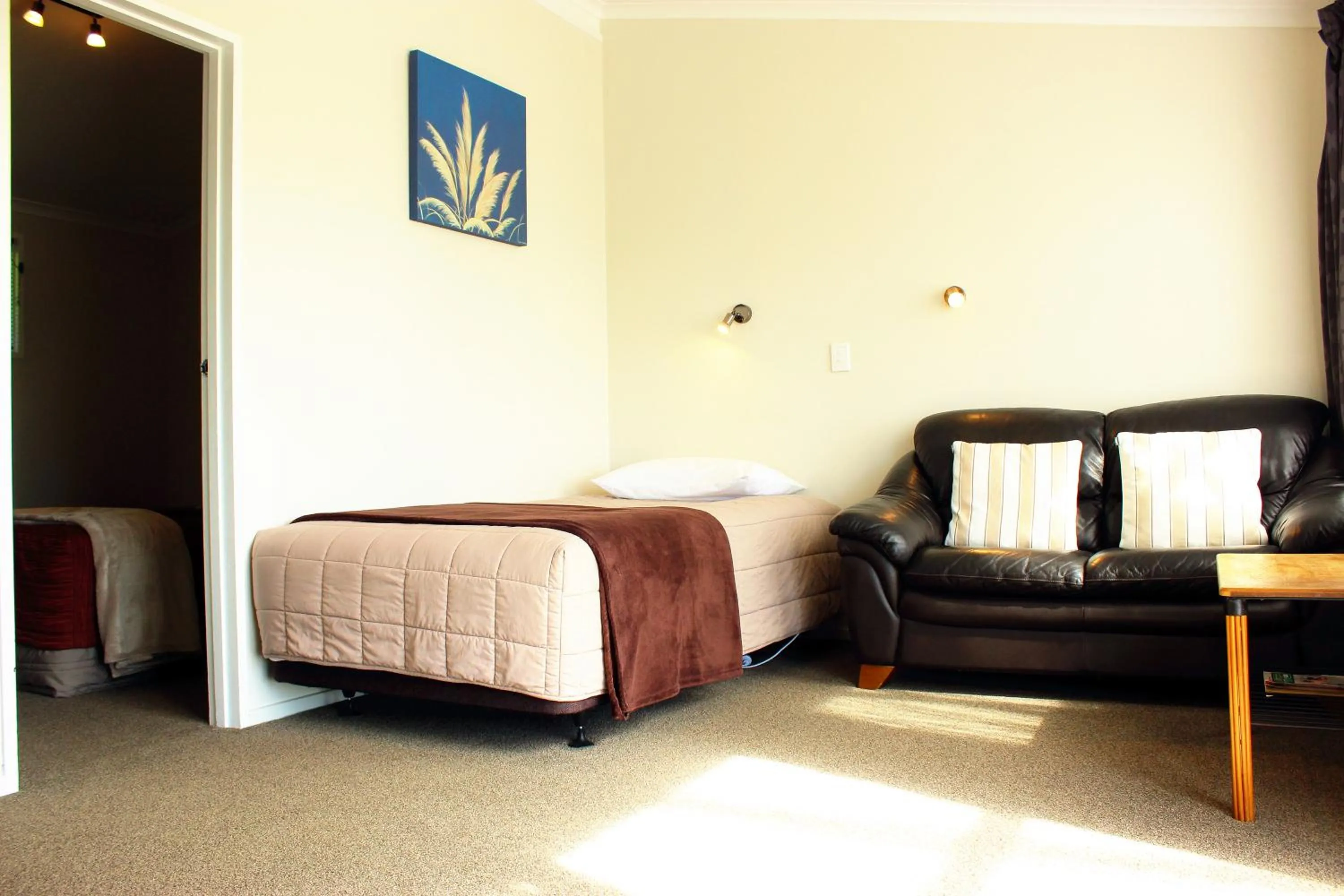 Bed in Te Awa Motel