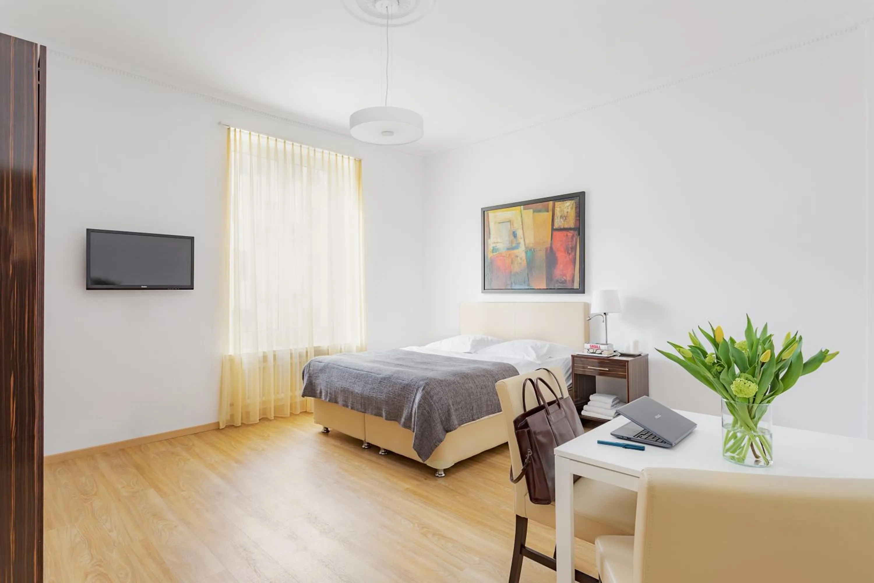 Photo of the whole room, Bed in Swiss Star Zurich University - Self Check-In