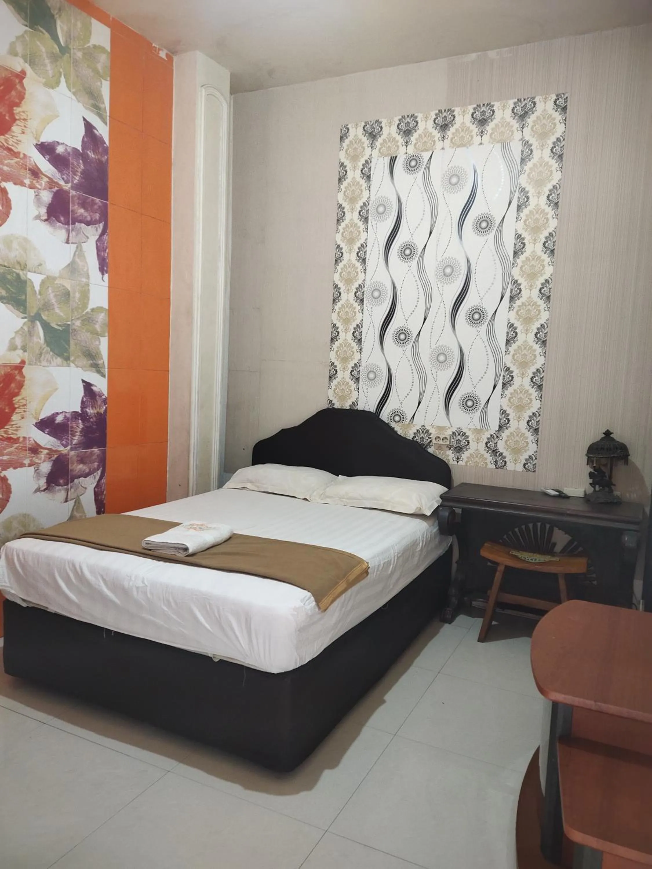 Bed in Mojokerto Classic Homestay