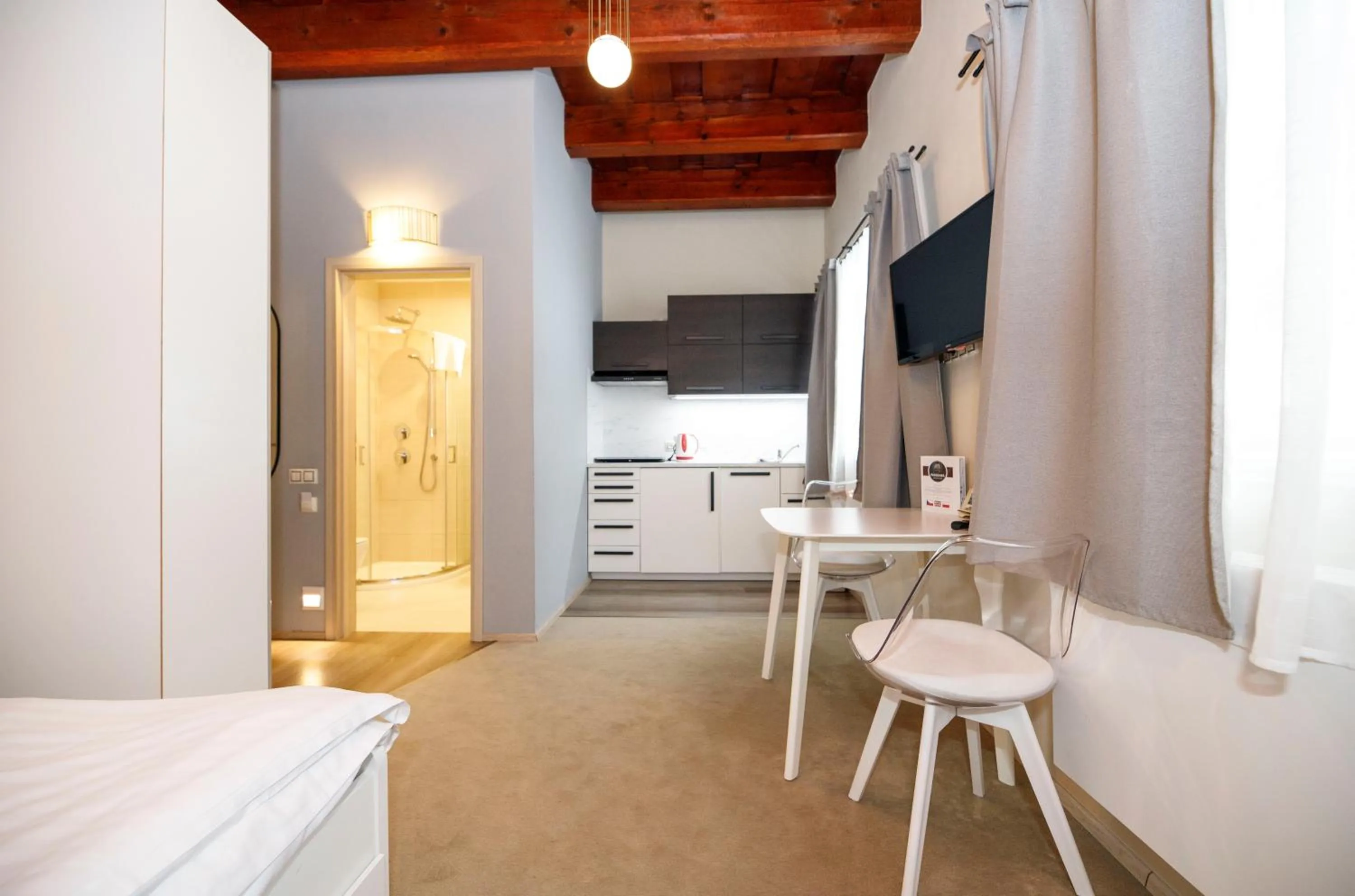 Kitchen or kitchenette, Bed in Aparthotel Panorama