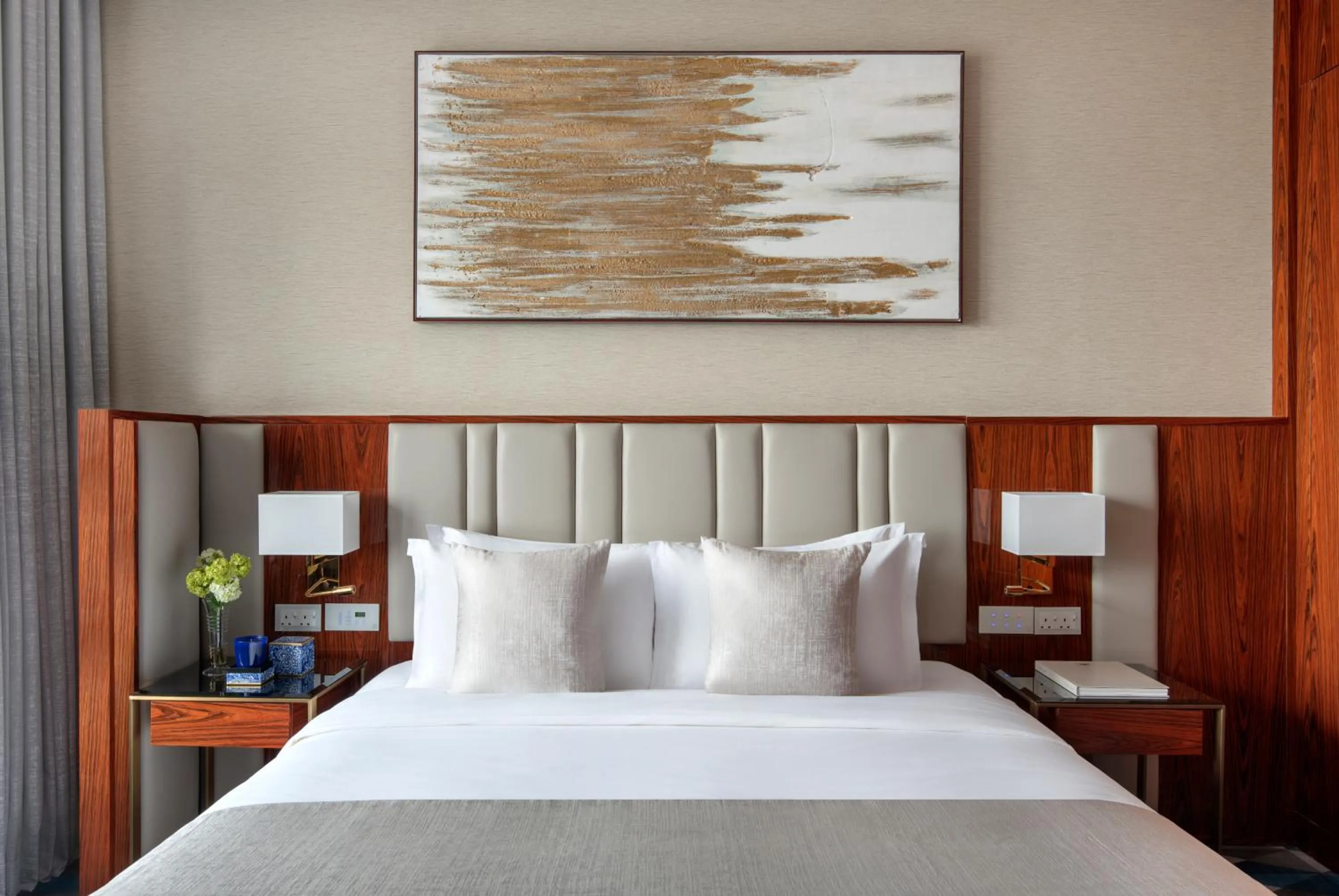 Bed in The Bentley Luxury Hotel & Suites