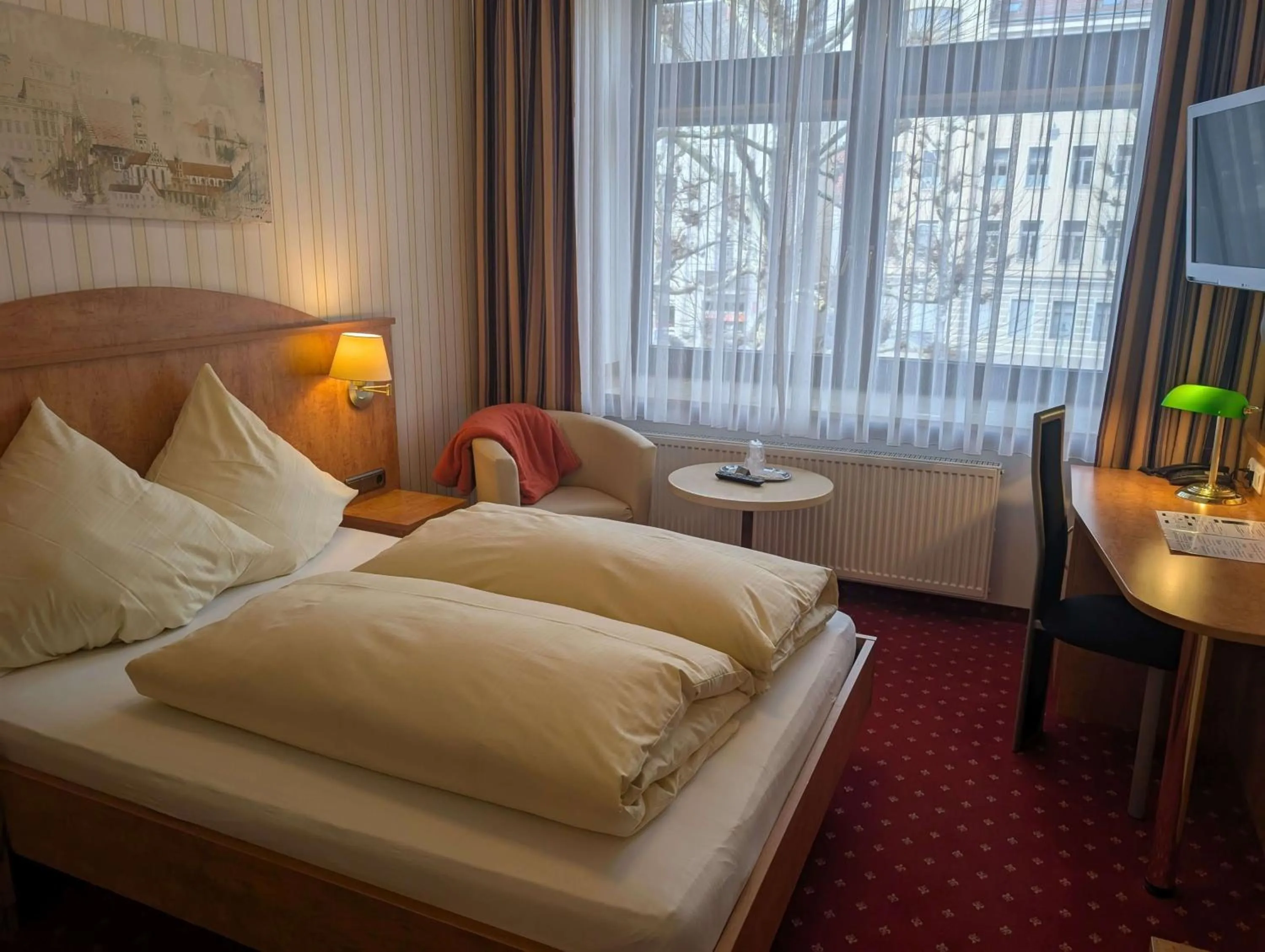 Bed in Stadthotel Augsburg