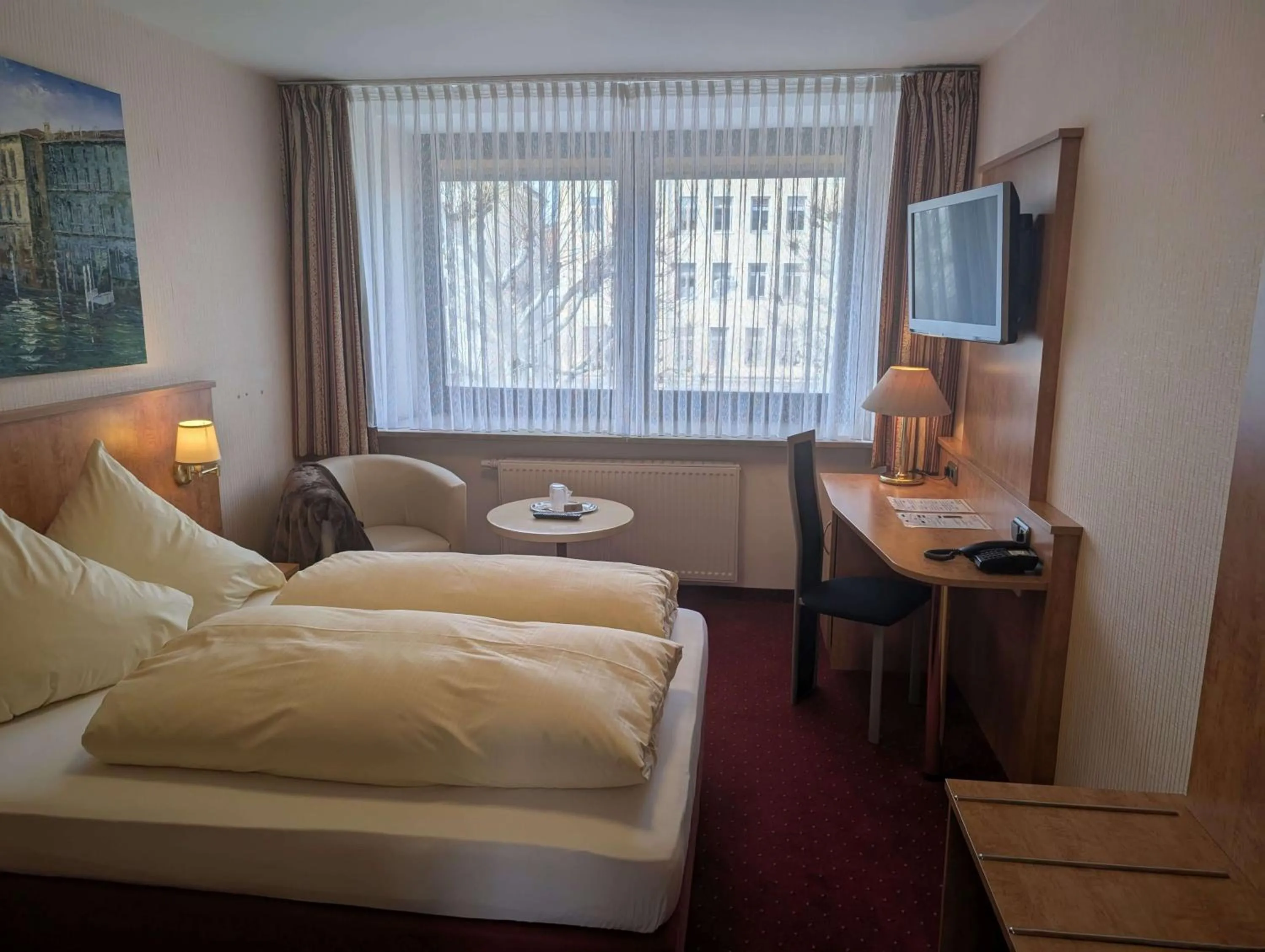 Bed in Stadthotel Augsburg