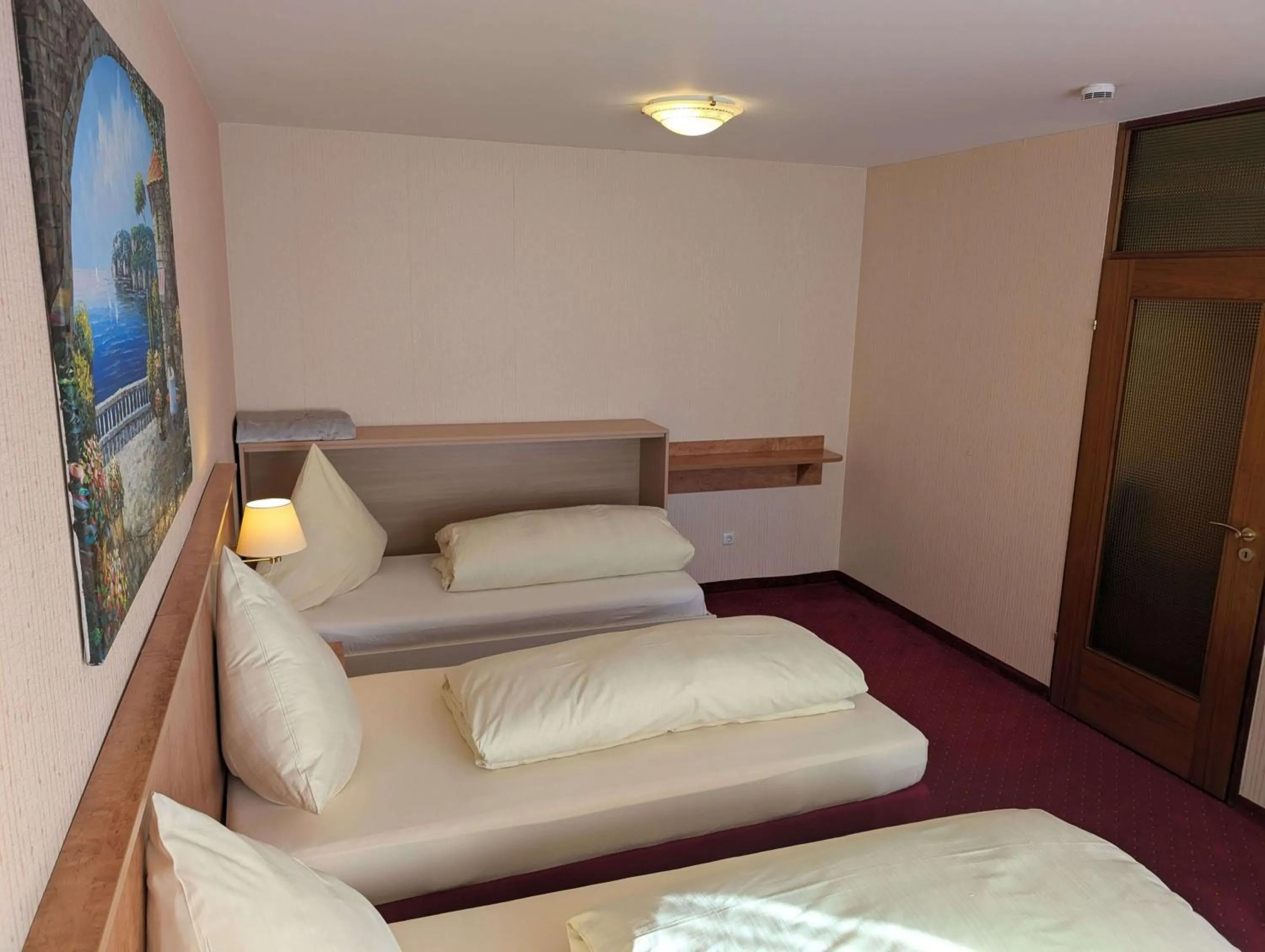 Bed in Stadthotel Augsburg