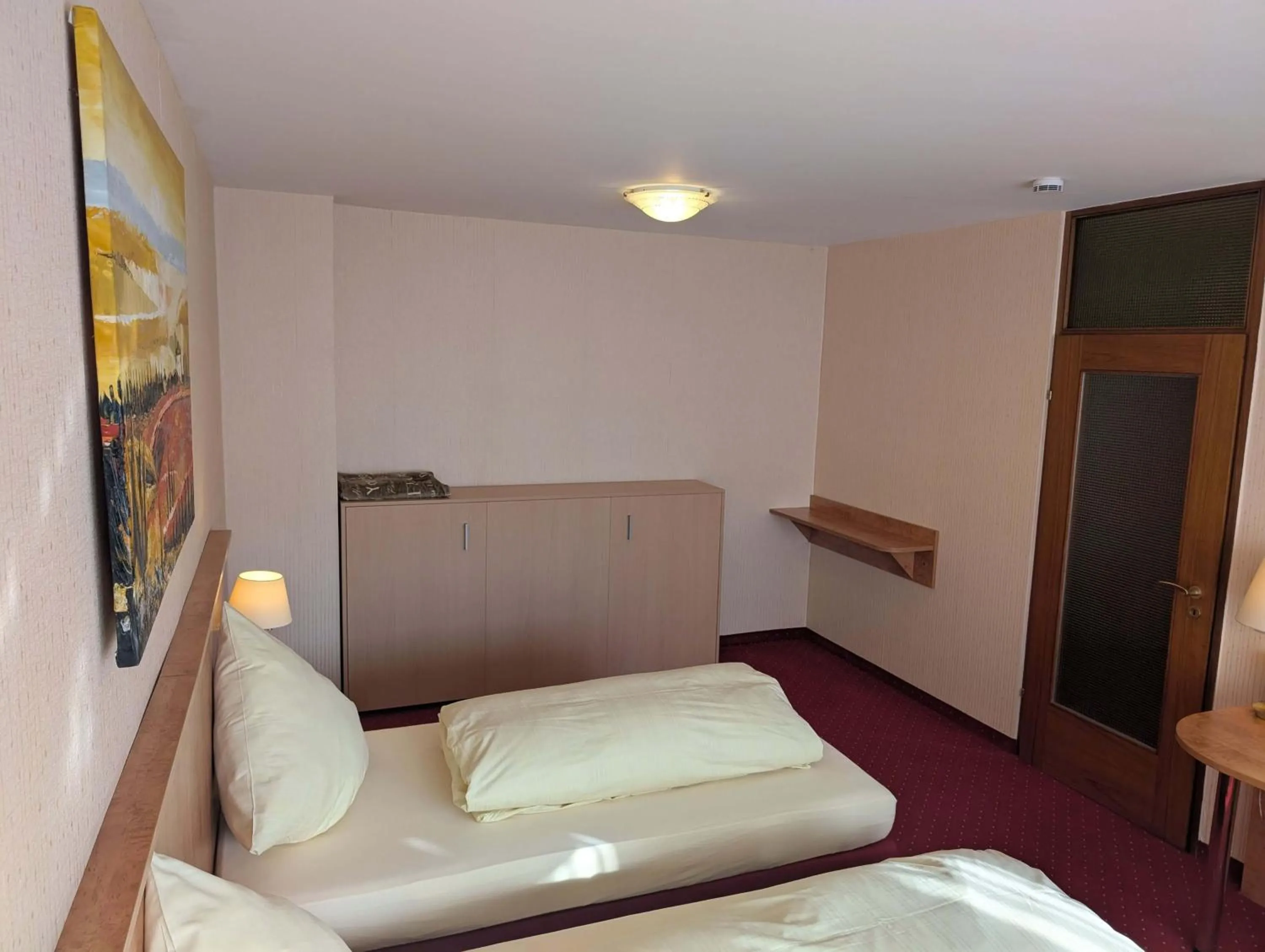 Bed in Stadthotel Augsburg