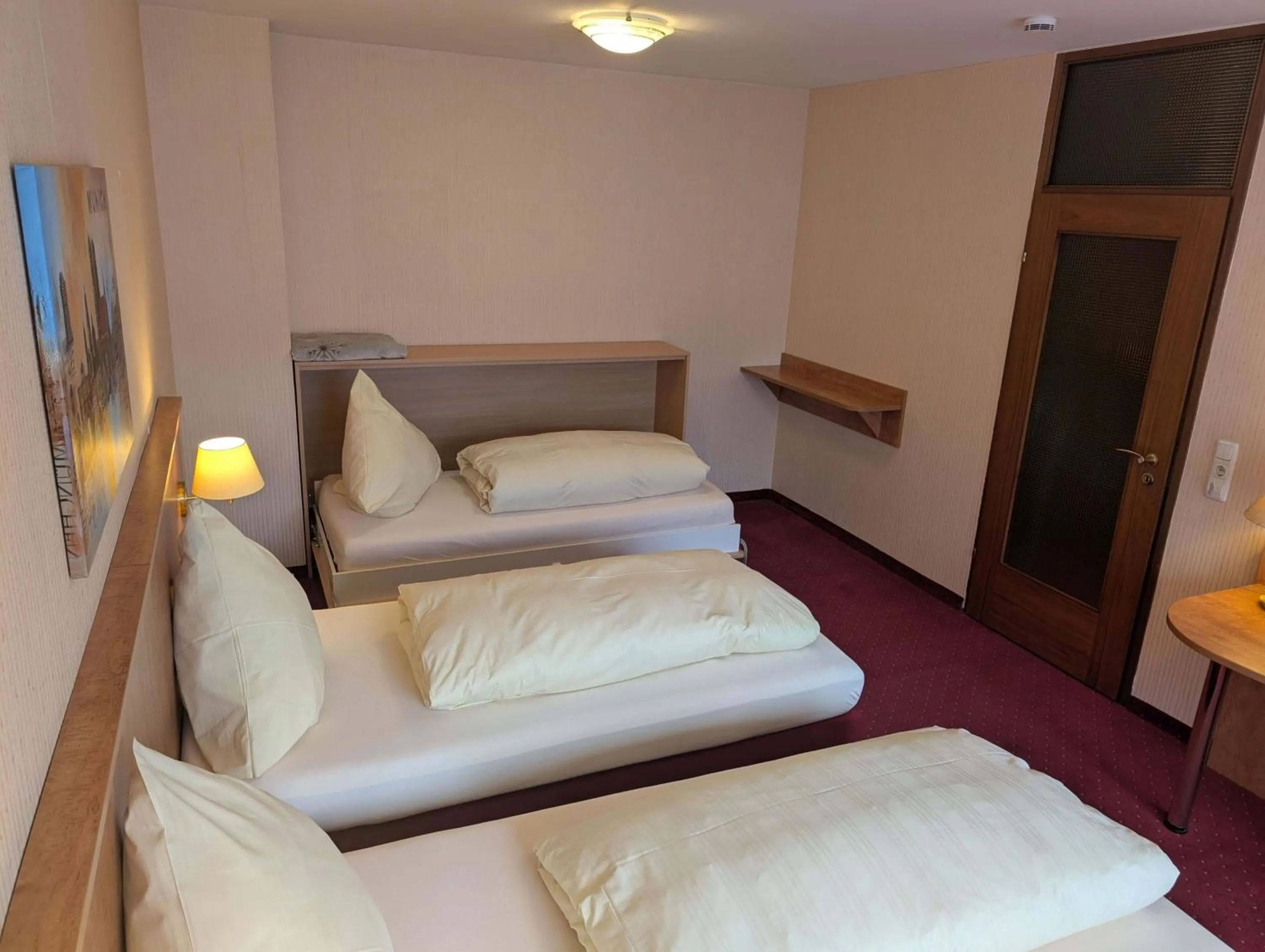 Bed in Stadthotel Augsburg