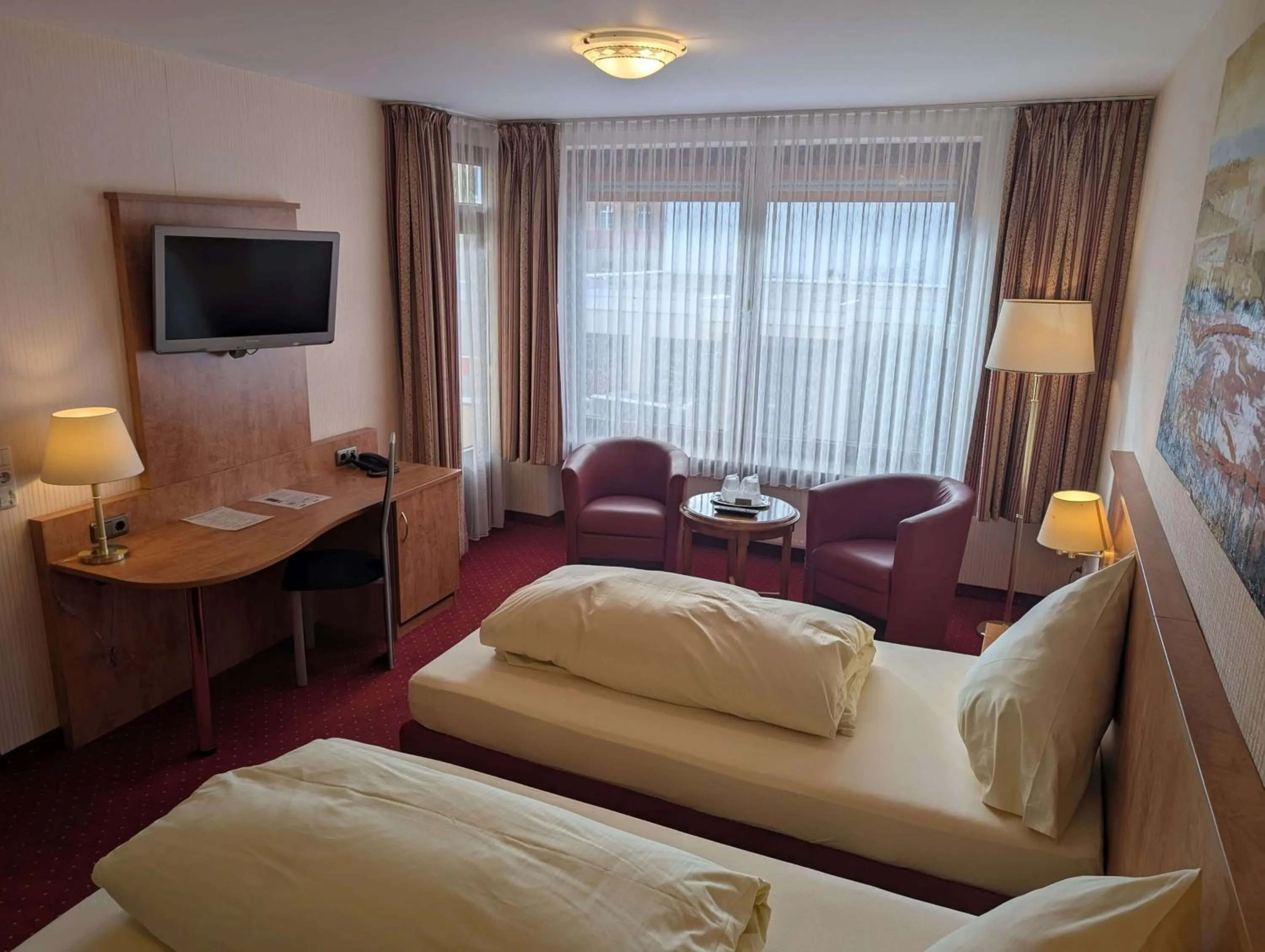 Bed in Stadthotel Augsburg