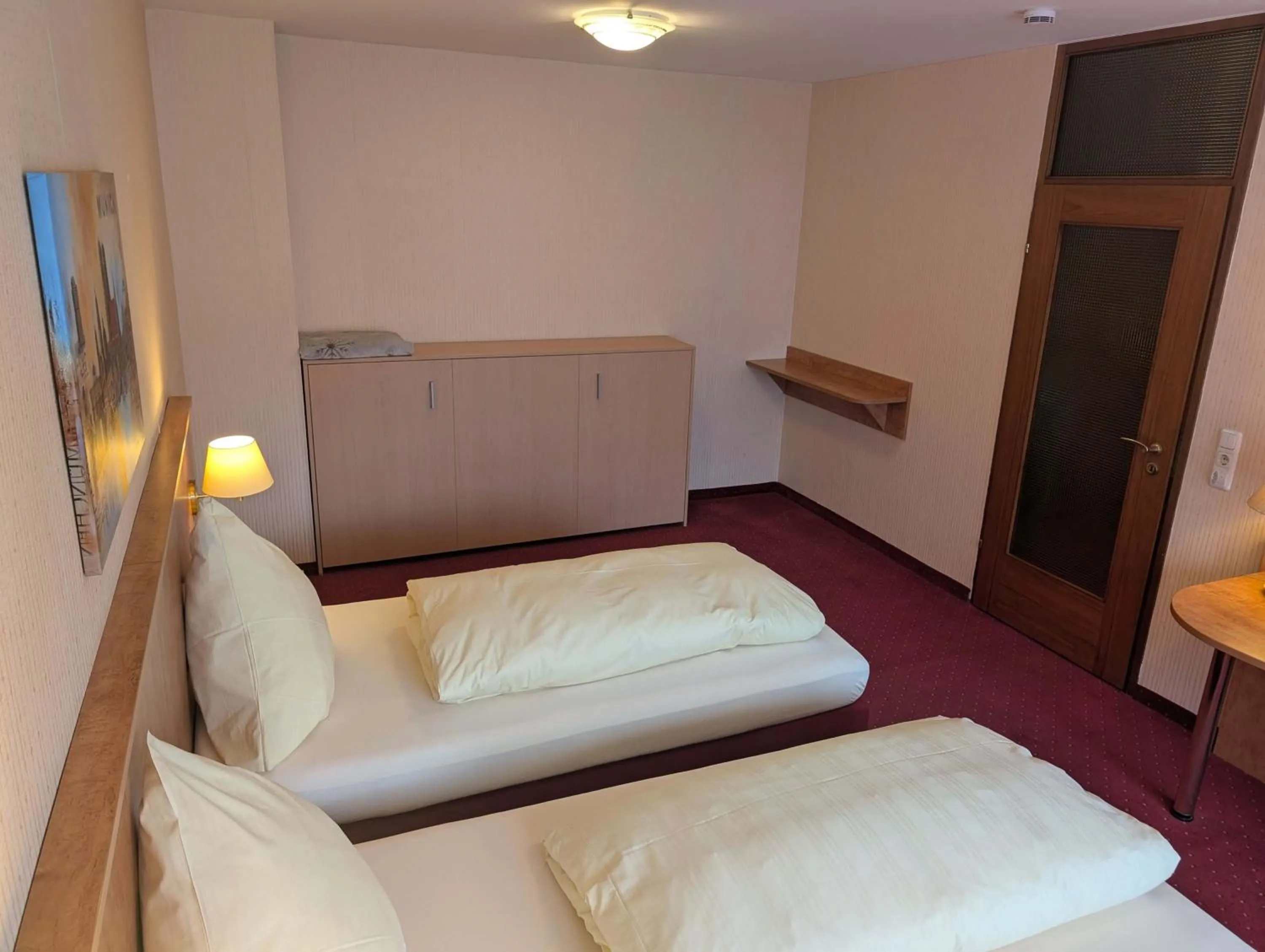 Bed in Stadthotel Augsburg