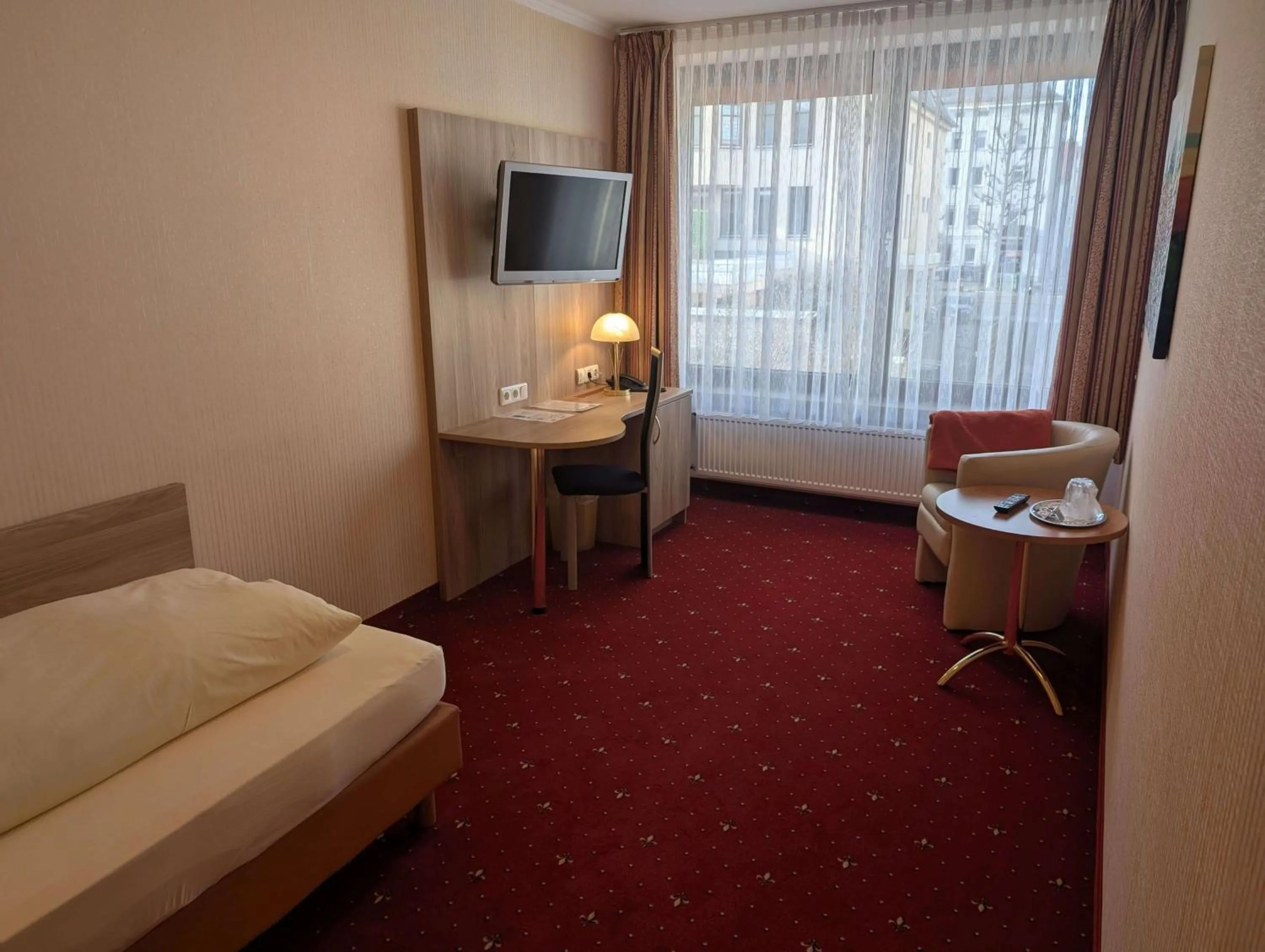 TV and multimedia, Bed in Stadthotel Augsburg