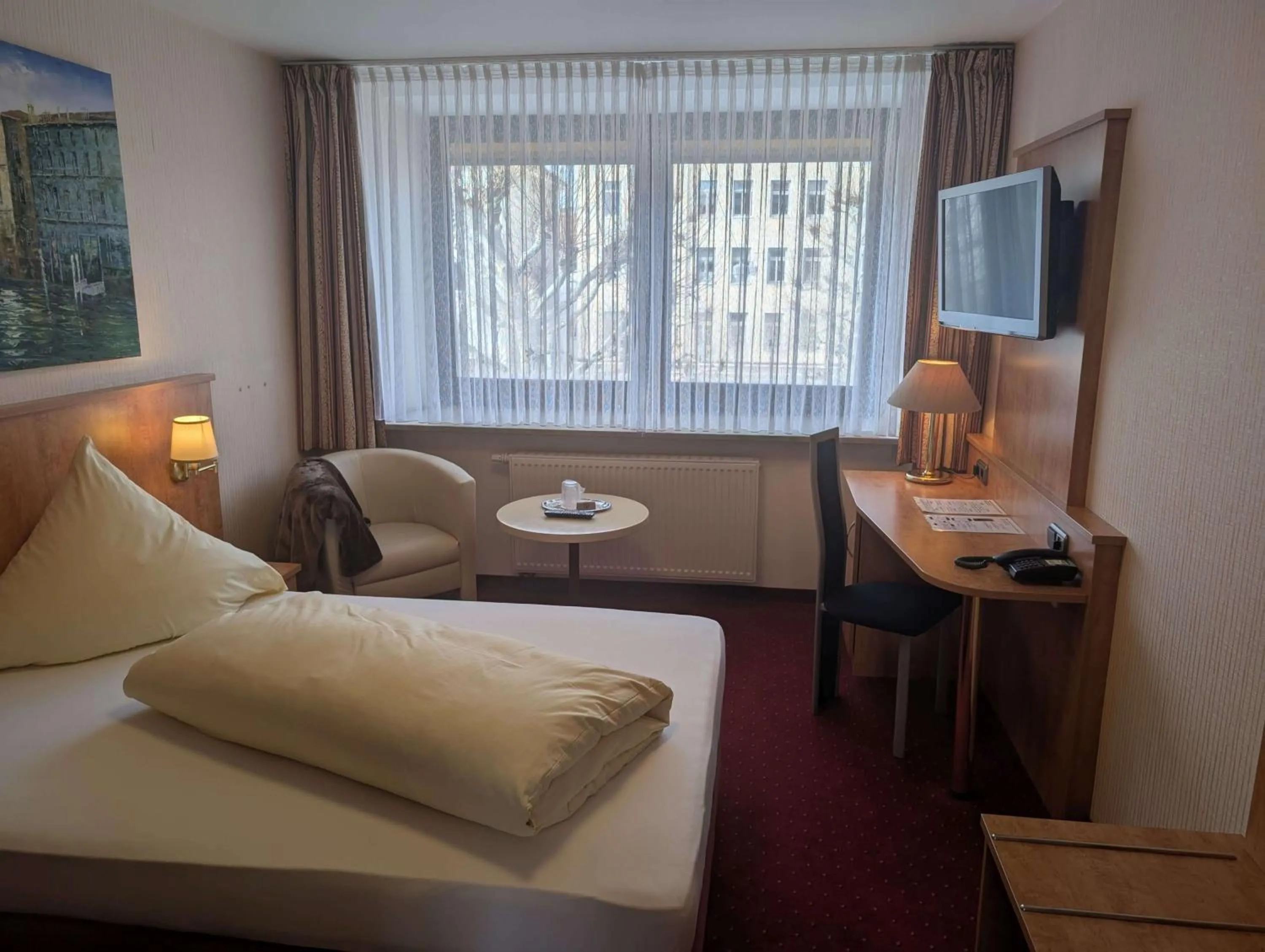 Bed in Stadthotel Augsburg