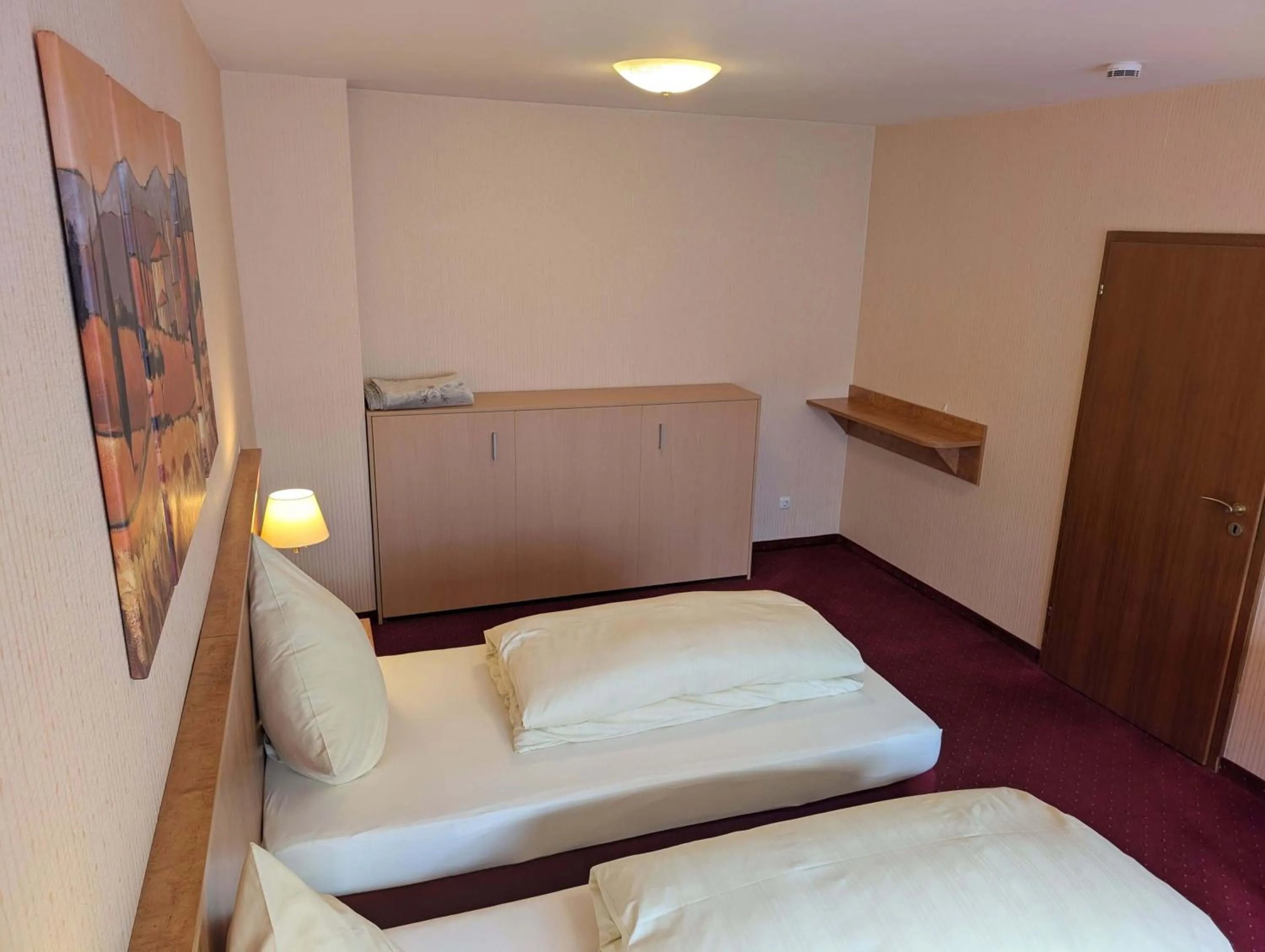 Bed in Stadthotel Augsburg