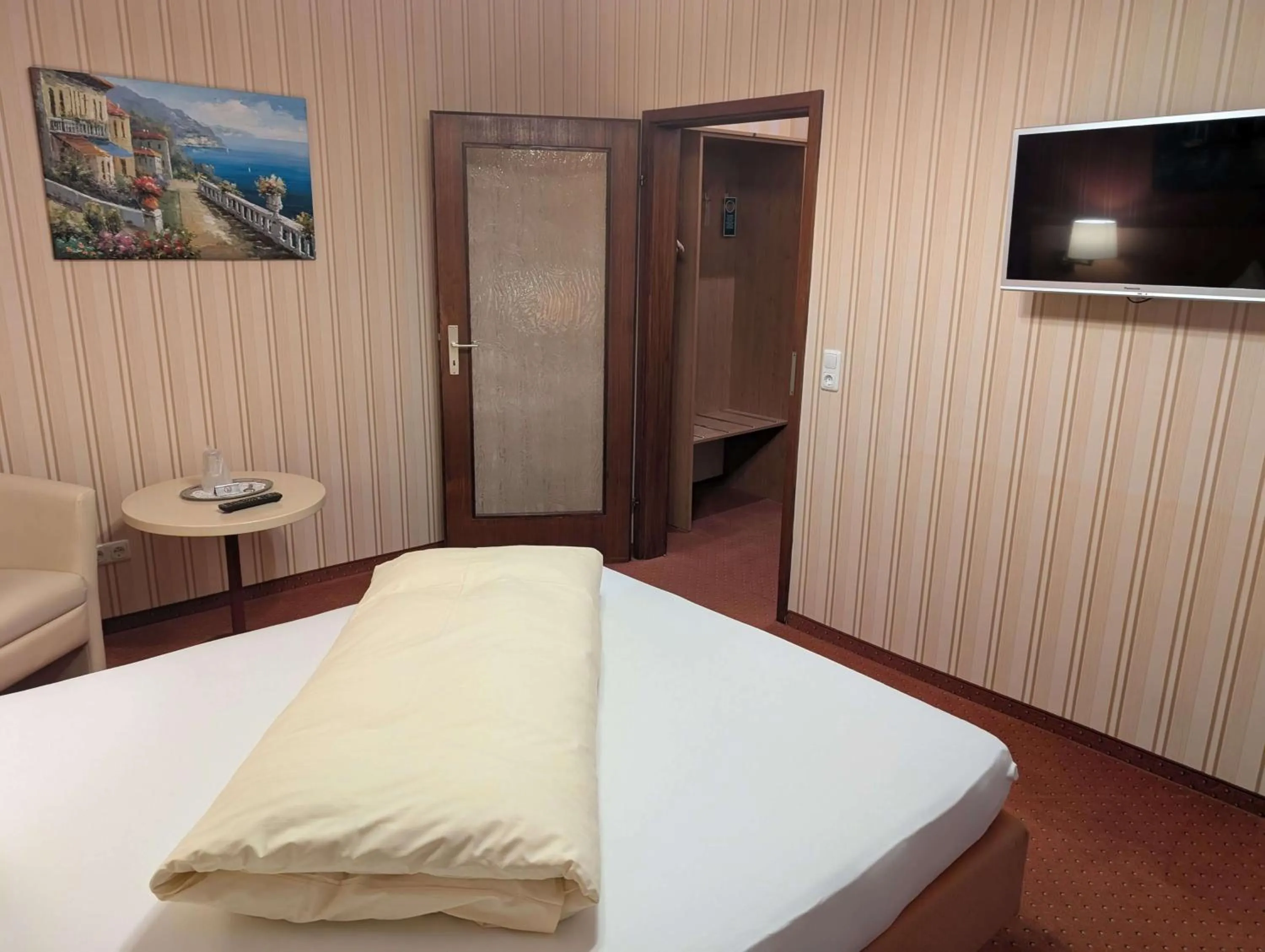 Bed in Stadthotel Augsburg