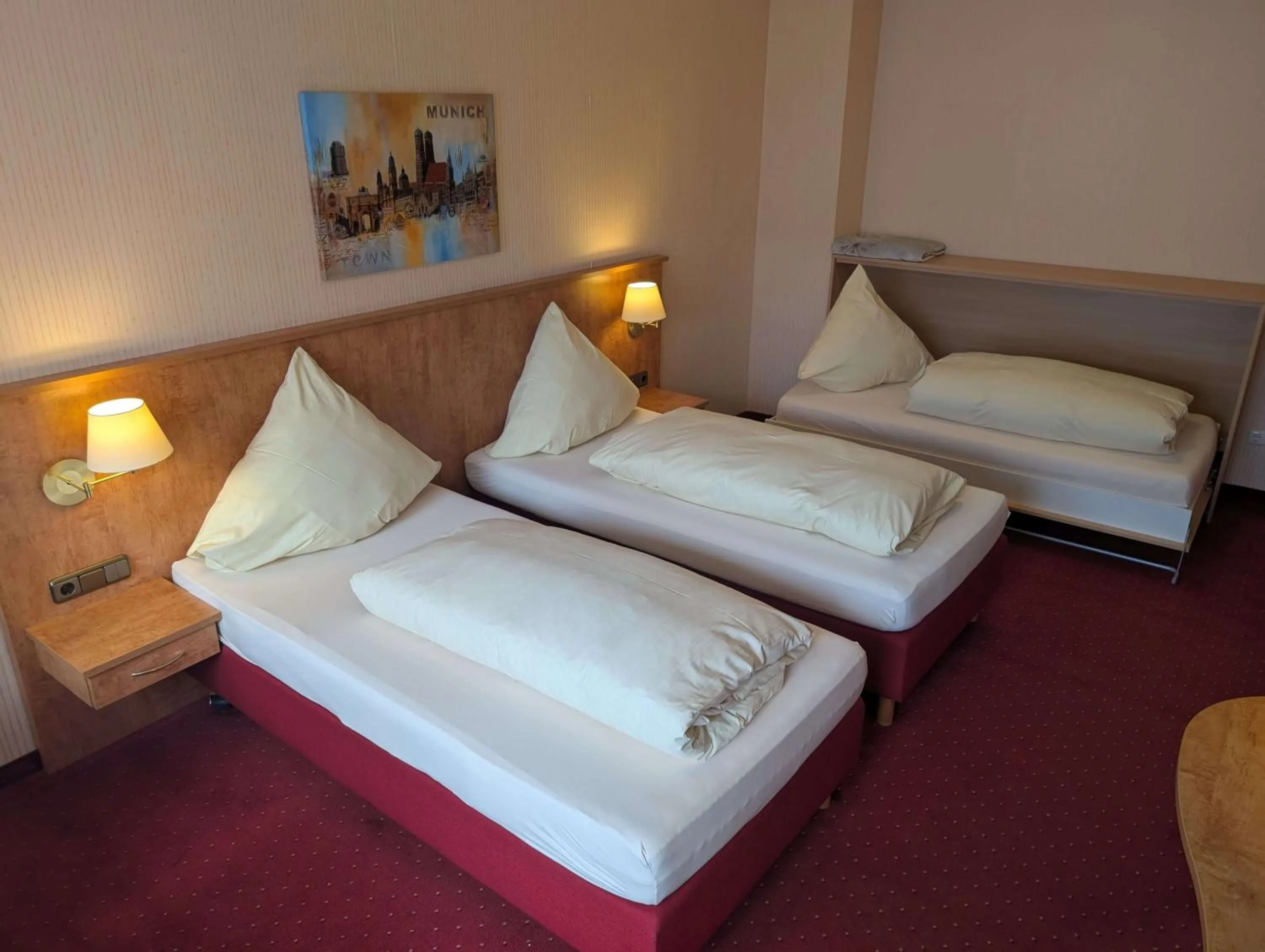 Bed in Stadthotel Augsburg