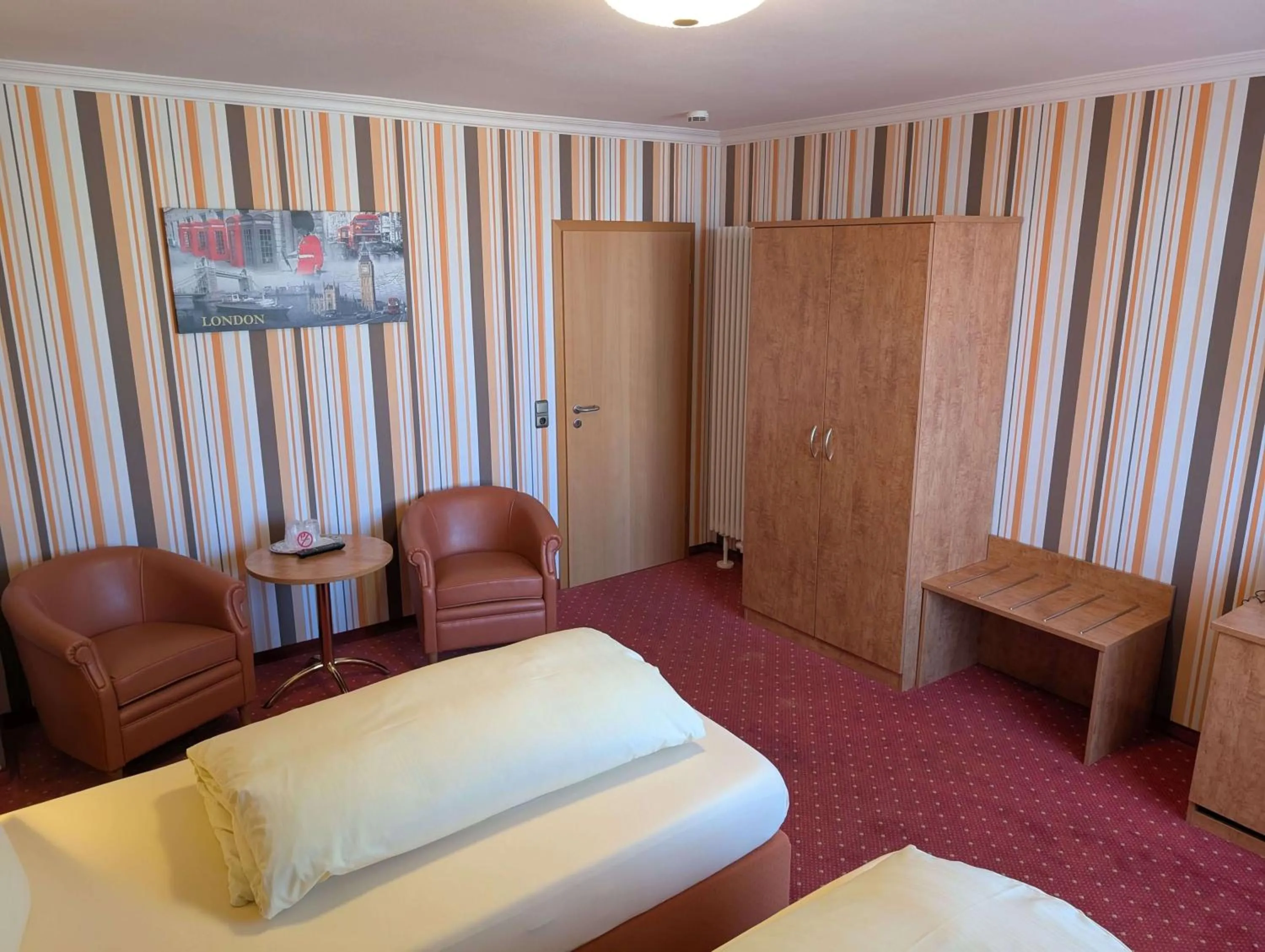 Bed in Stadthotel Augsburg