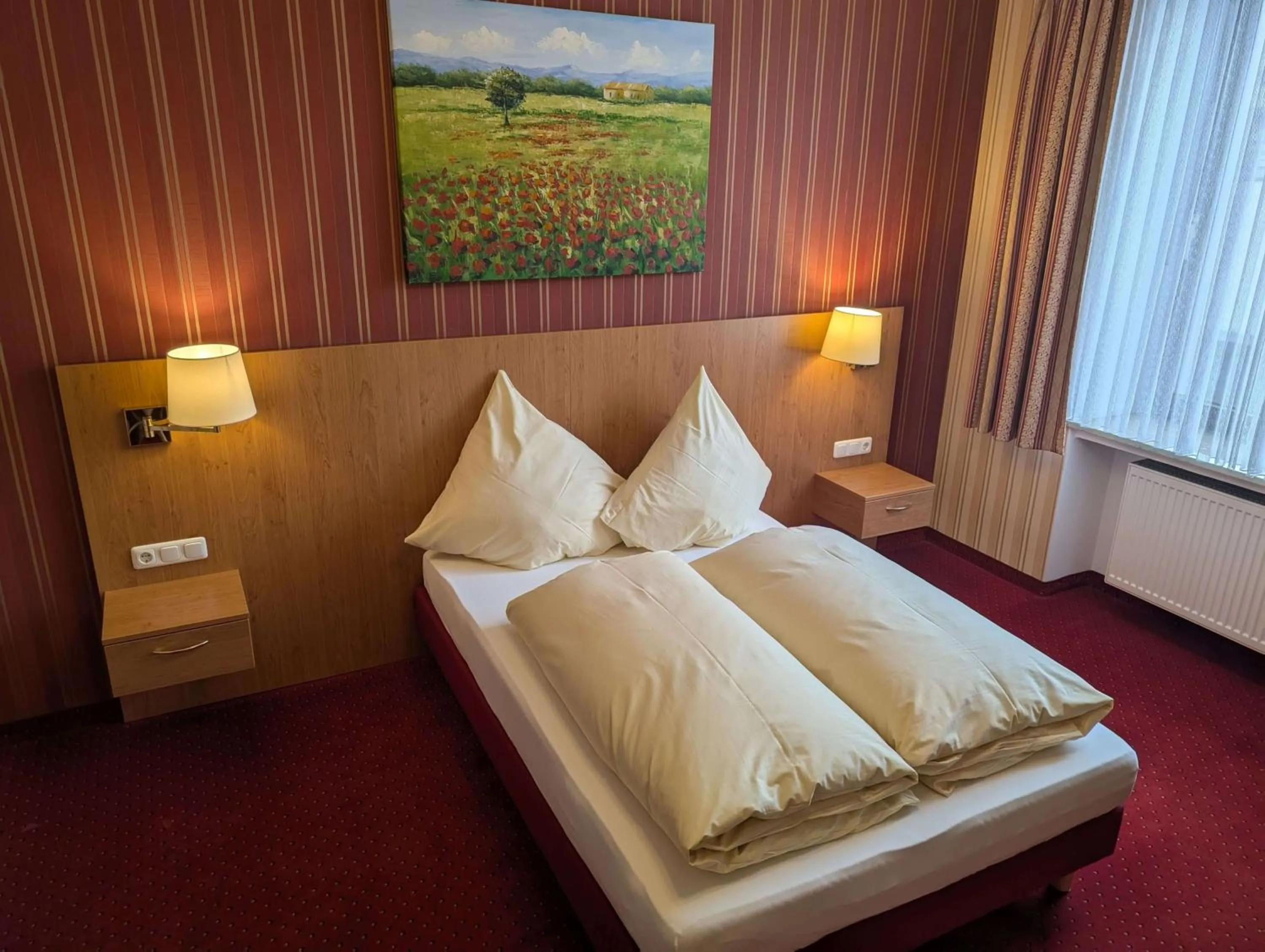 Bed in Stadthotel Augsburg